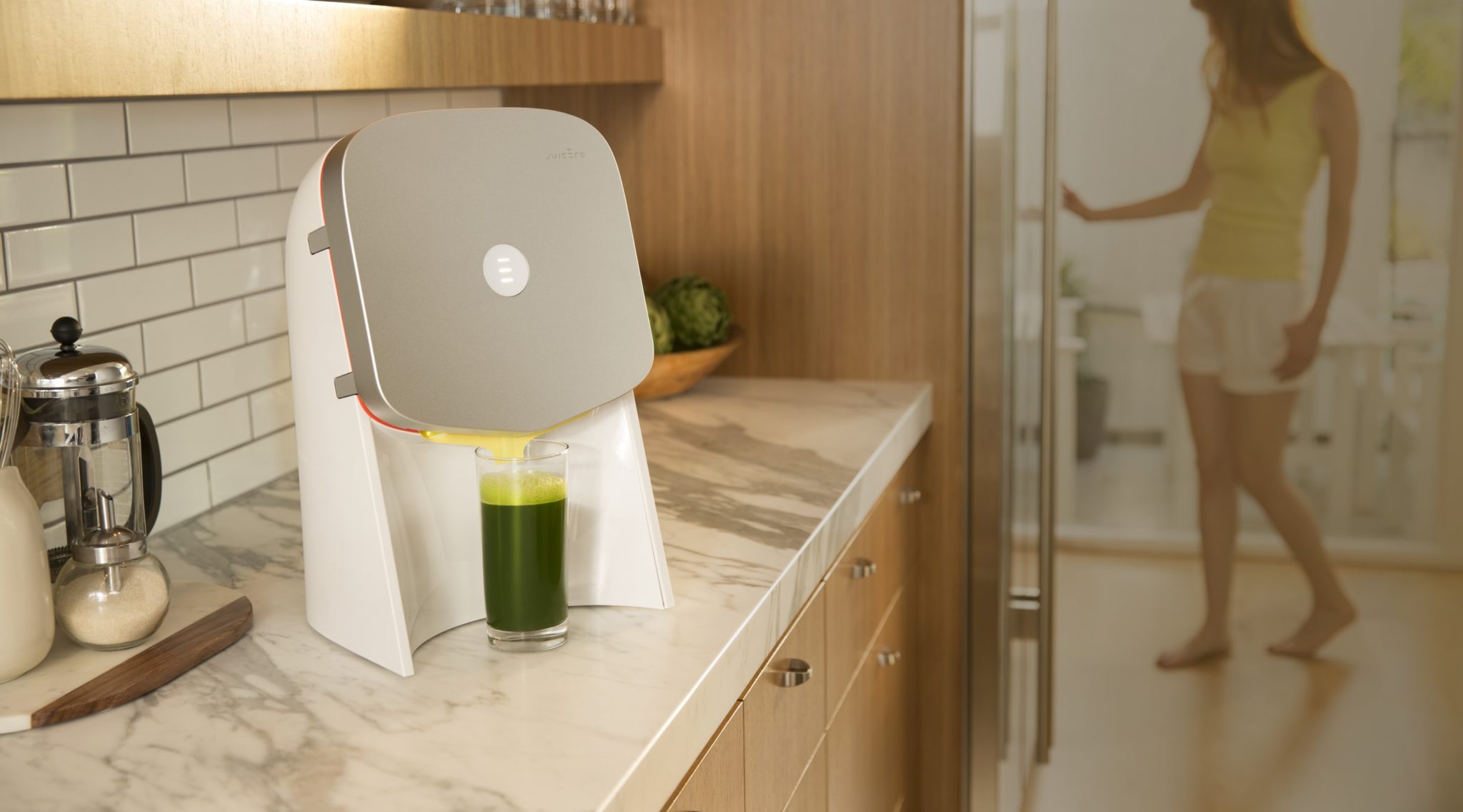 | Source: Juicero | The Juicero Juice Presser, Pressing a Green Juice
