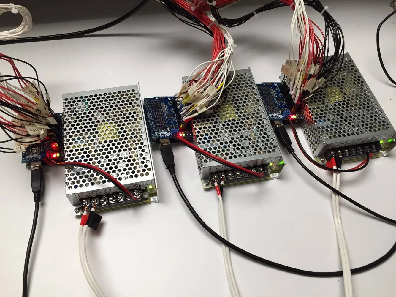 333: 3 power supplies: 5V @ 5 Amps, powering the 3 Arduino Uno Processing Boards with 3 Adafruit 16-Channel 12-bit PWM/Servo Shield - I2C interface
