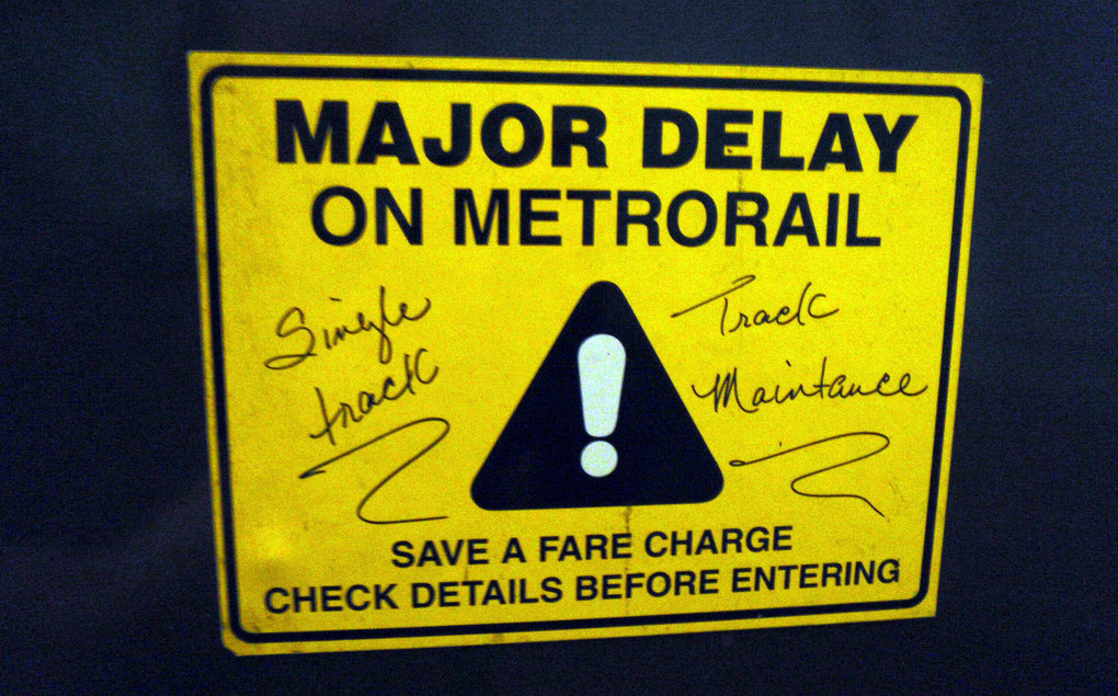 Error recovery: Signs outside the paid station area alert DC Metrorail passengers to delays. Photo credit: Daniel Lobo, Flickr
