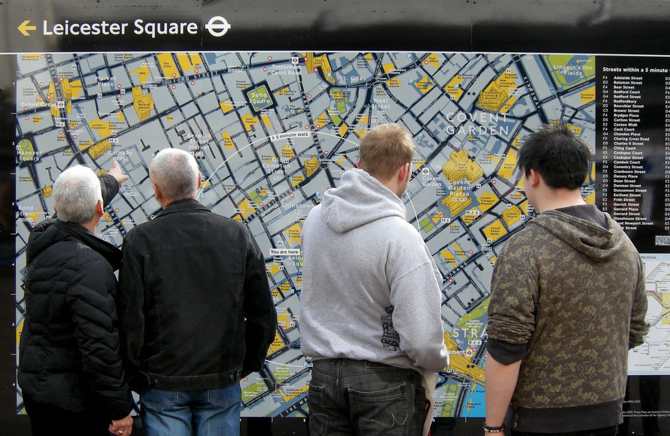 Pedestrians interact with a legible london map. Photo credit: Martin deutsch, flickr