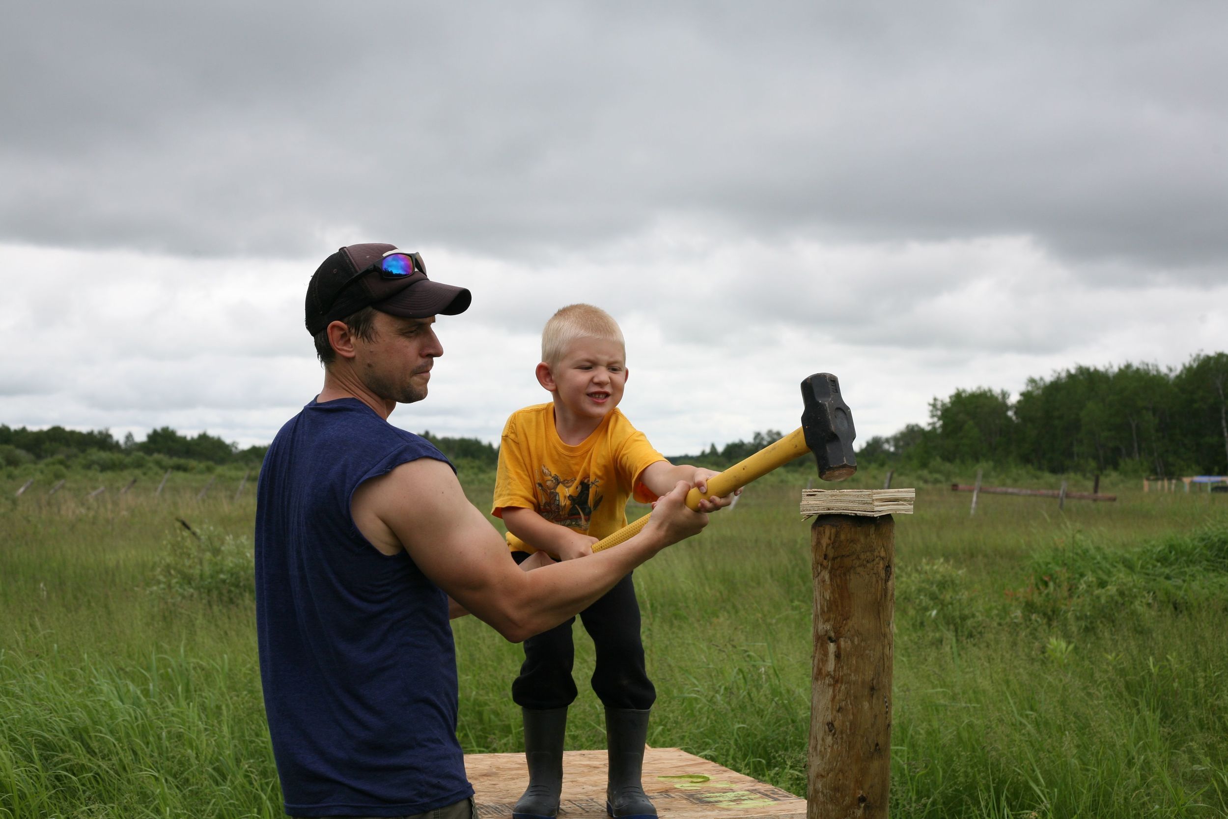 We all took a turn with the inaugural first fence post!
