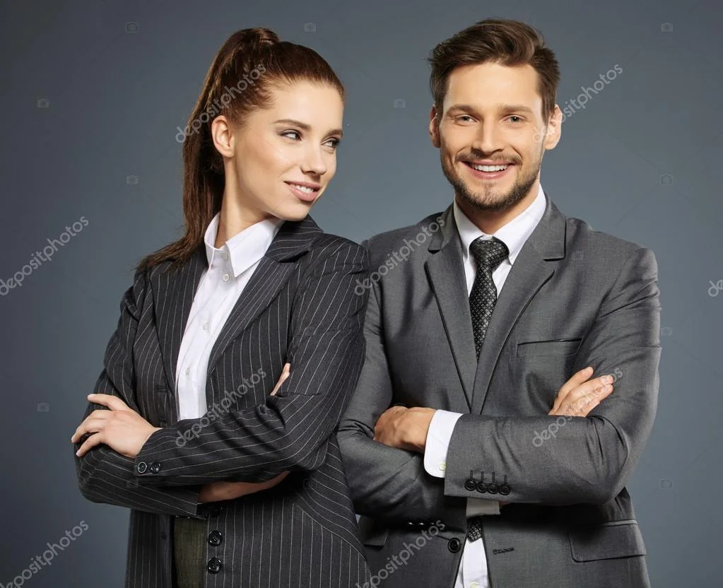 depositphotos_83841578-stock-photo-business-couple-in-suits.jpg