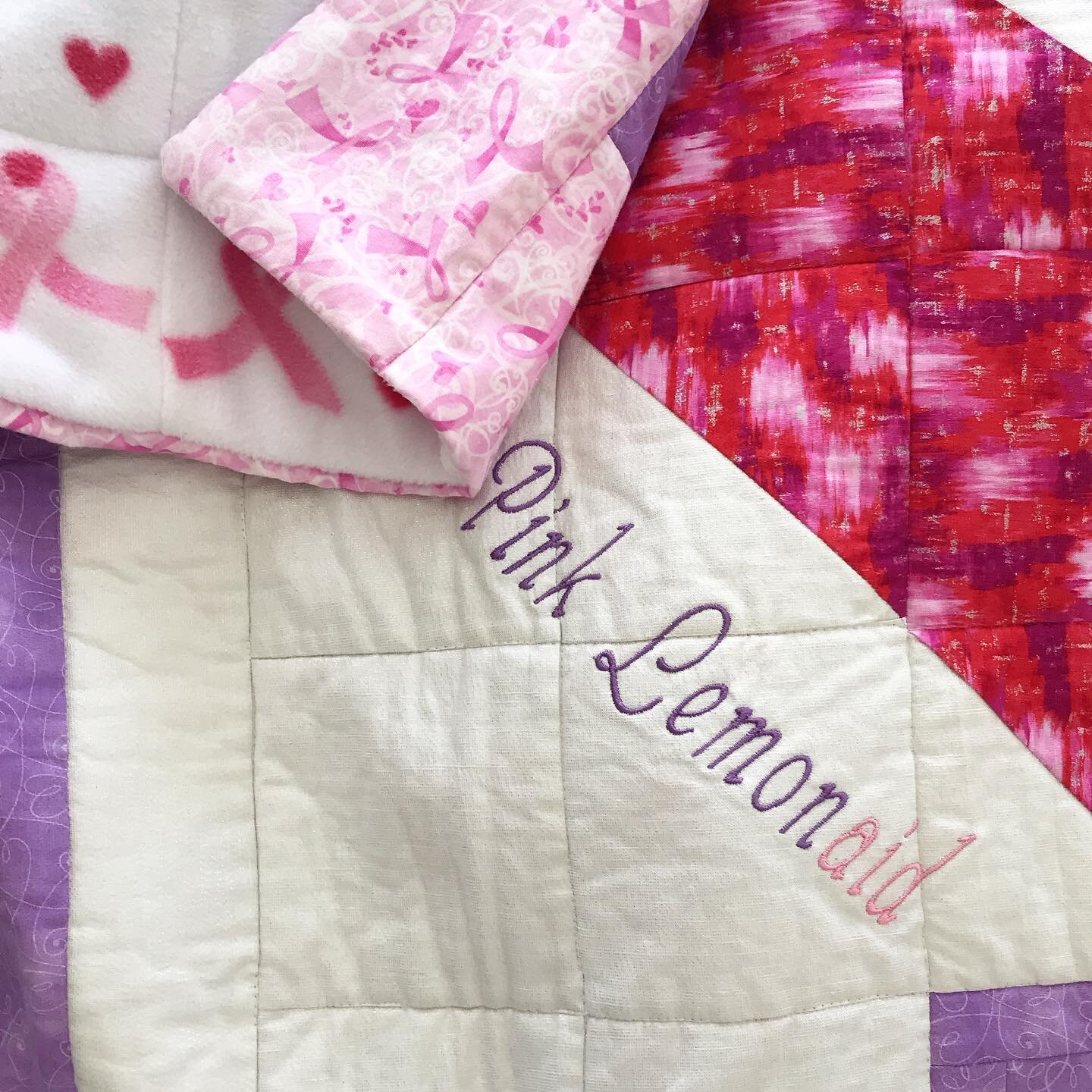 Cozying up with this incredible #breastcancerawareness quilt by my friend Donna @fallenbluequilts_ 
So honored to have this piece of art and reminder of how blessed I am to be alive and tell my story. Love you Donna! ❤️