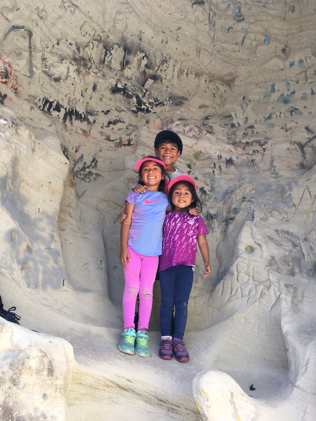 Christian, Mia and Eva (tallest to shortest) hiking on Annie's trail in Solana Beach, CA