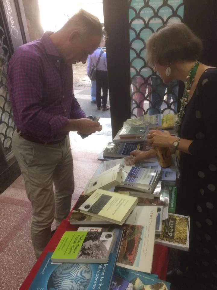 Professor Sverker Sörlin making a purchase at the ESEH conference in Zagreb. ICEHO President Verena Winiwarter collects the donation.