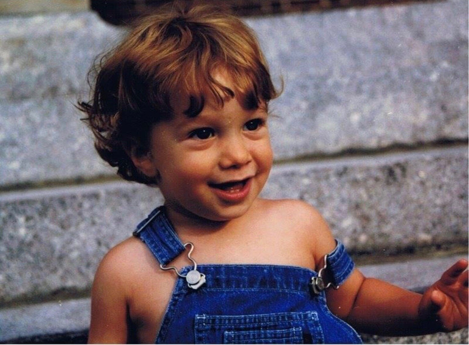  Sam as a toddler wearing one-armed overalls. 