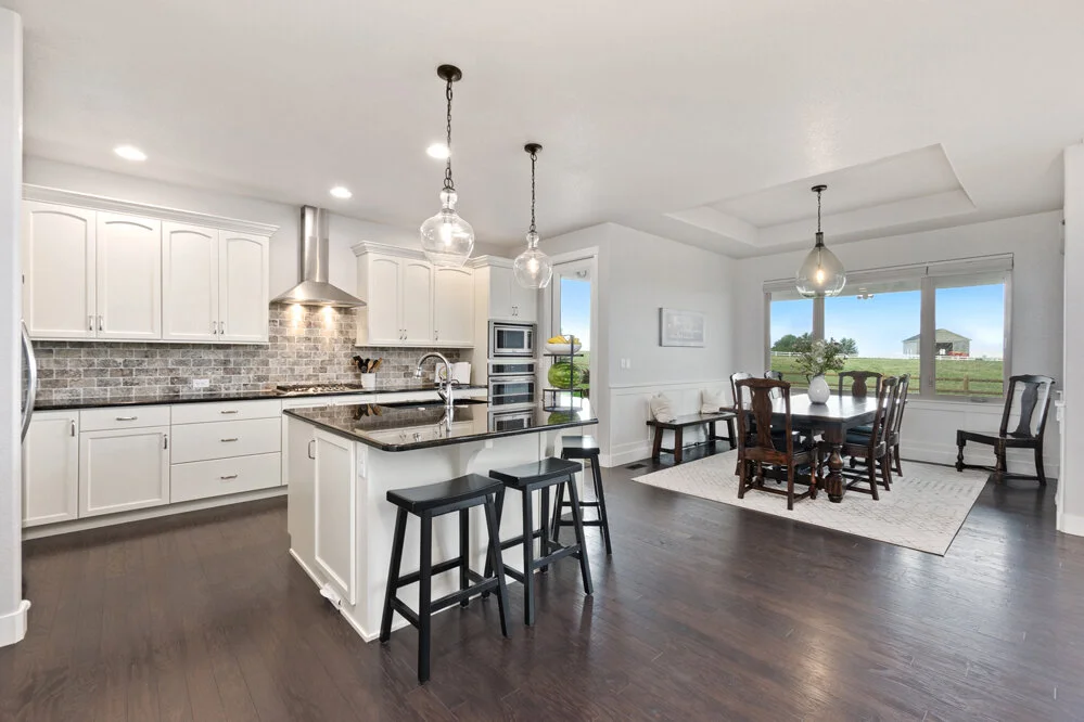 Kitchen w/ SS Vent and Appliances