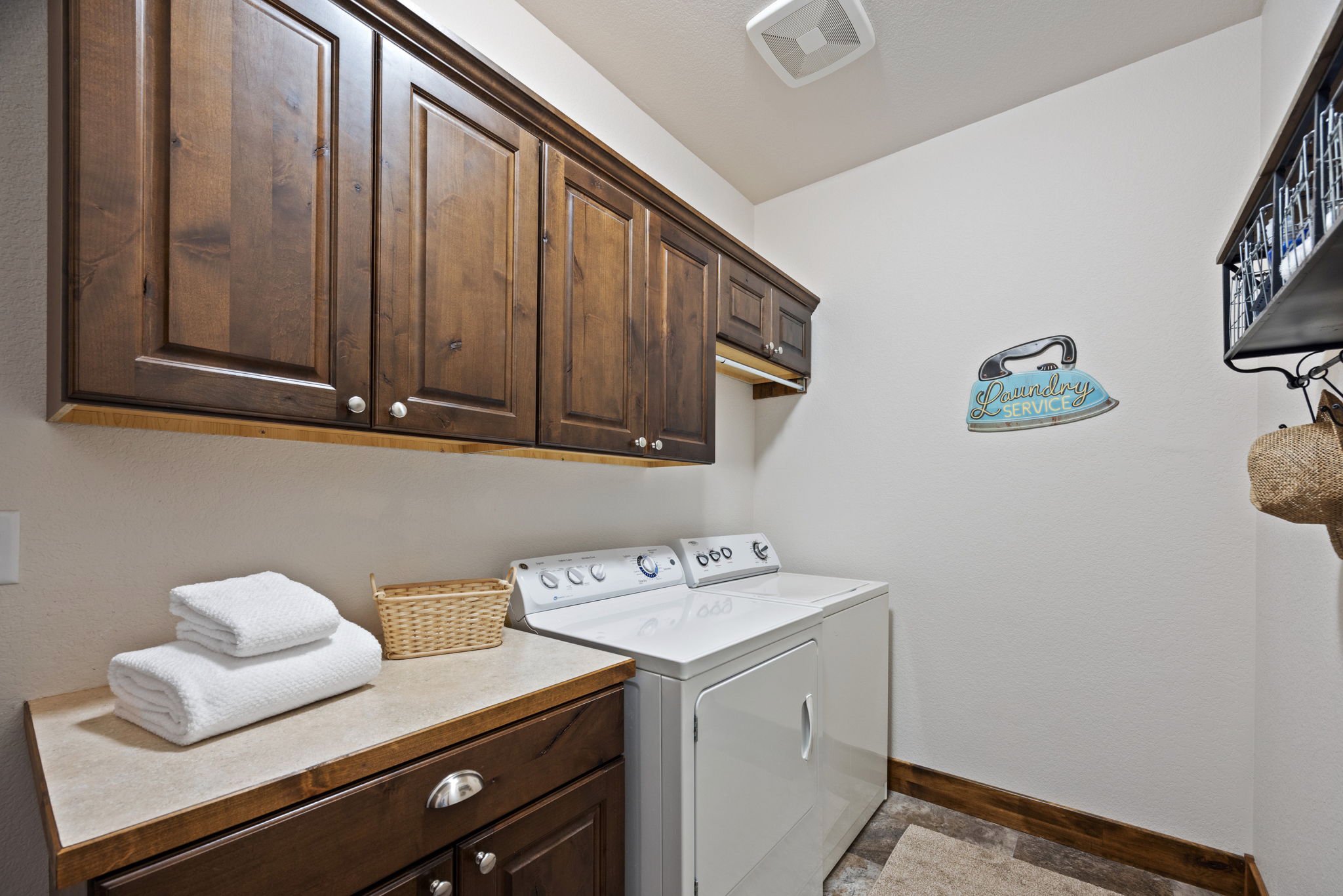 Large Laundry Room w/ Built-In Cabinetry and Folding Space