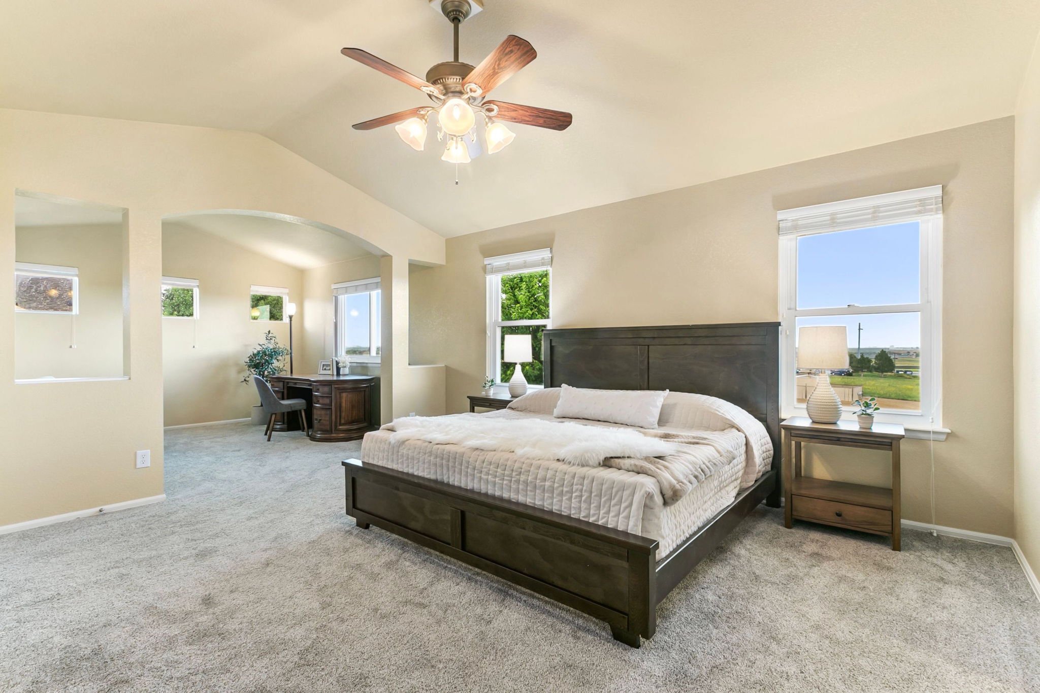 Primary Bedroom Features Double Walk-in Closets