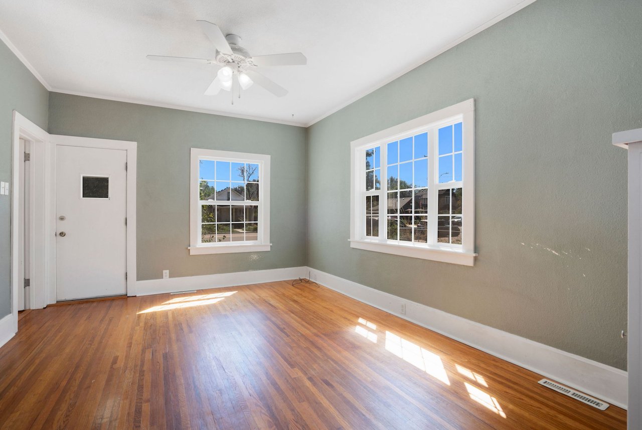 Large living room space with natural light pouring in