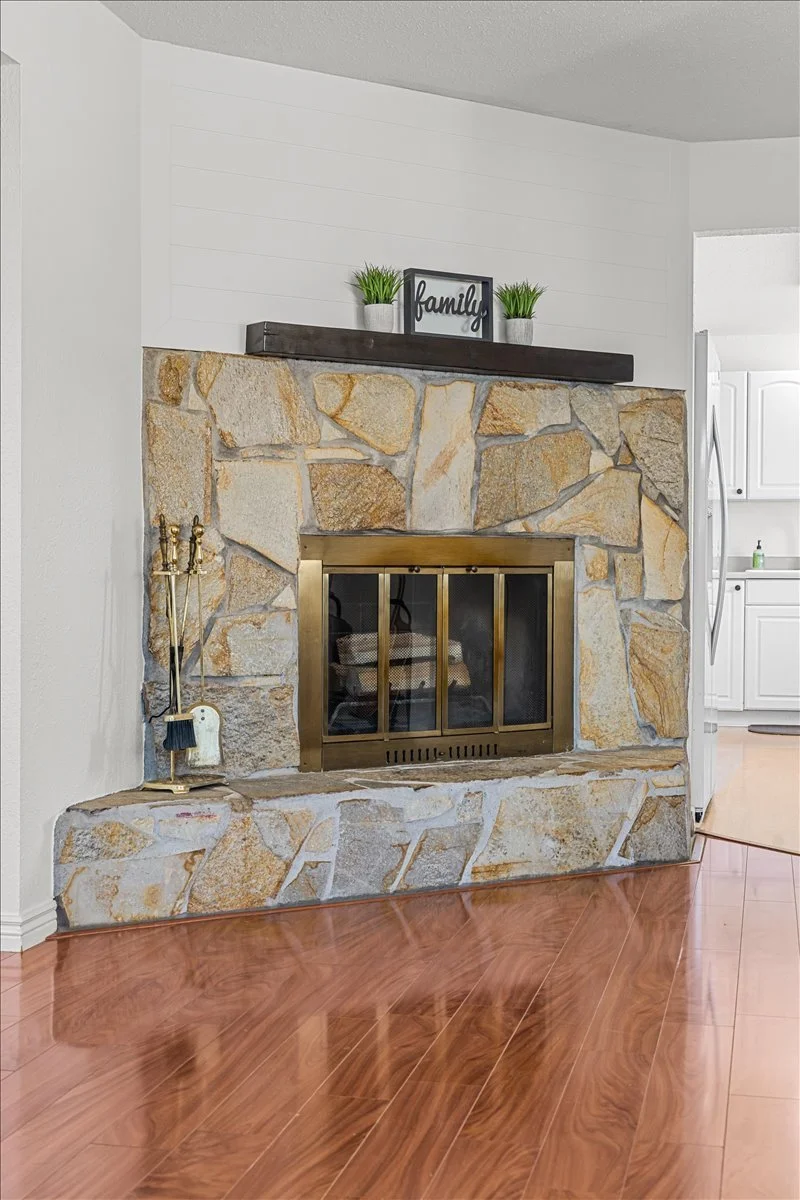 Cozy wood-burning fireplace in the living room