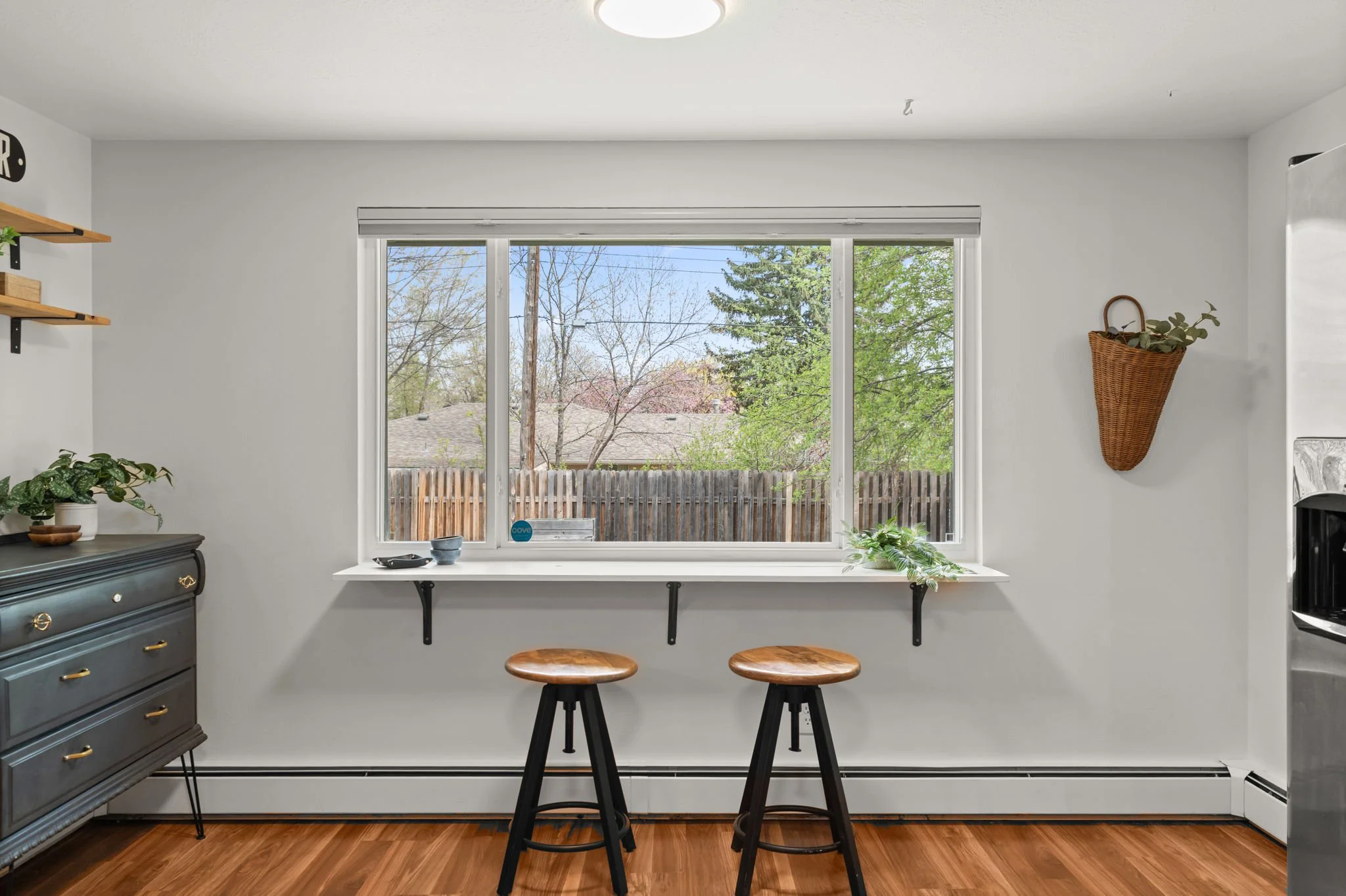 Kitchen window overlooking the backyard