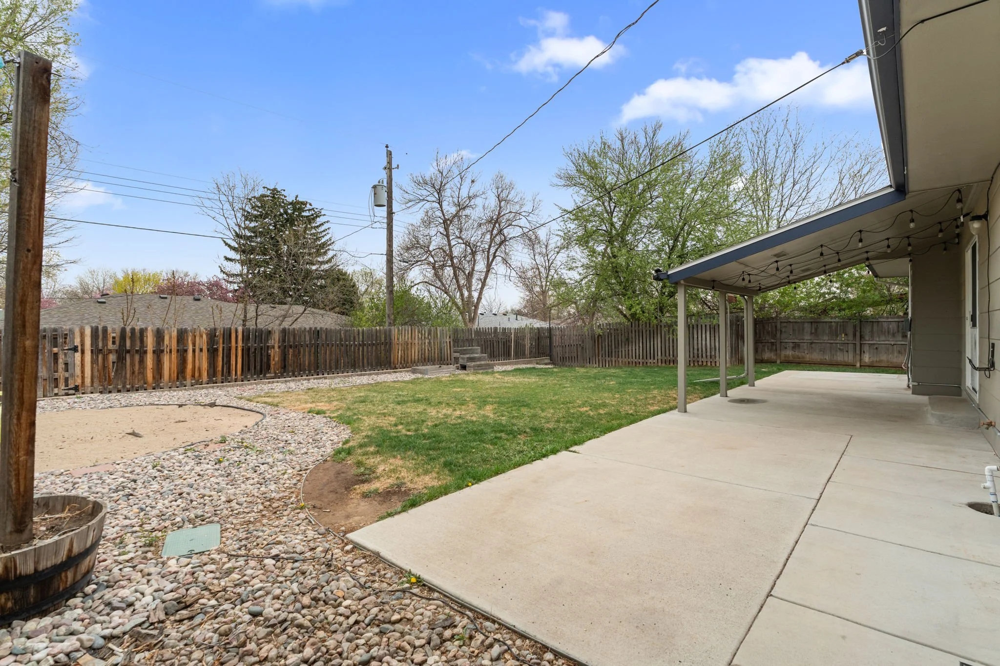 The backyard is set up for both relaxation and function