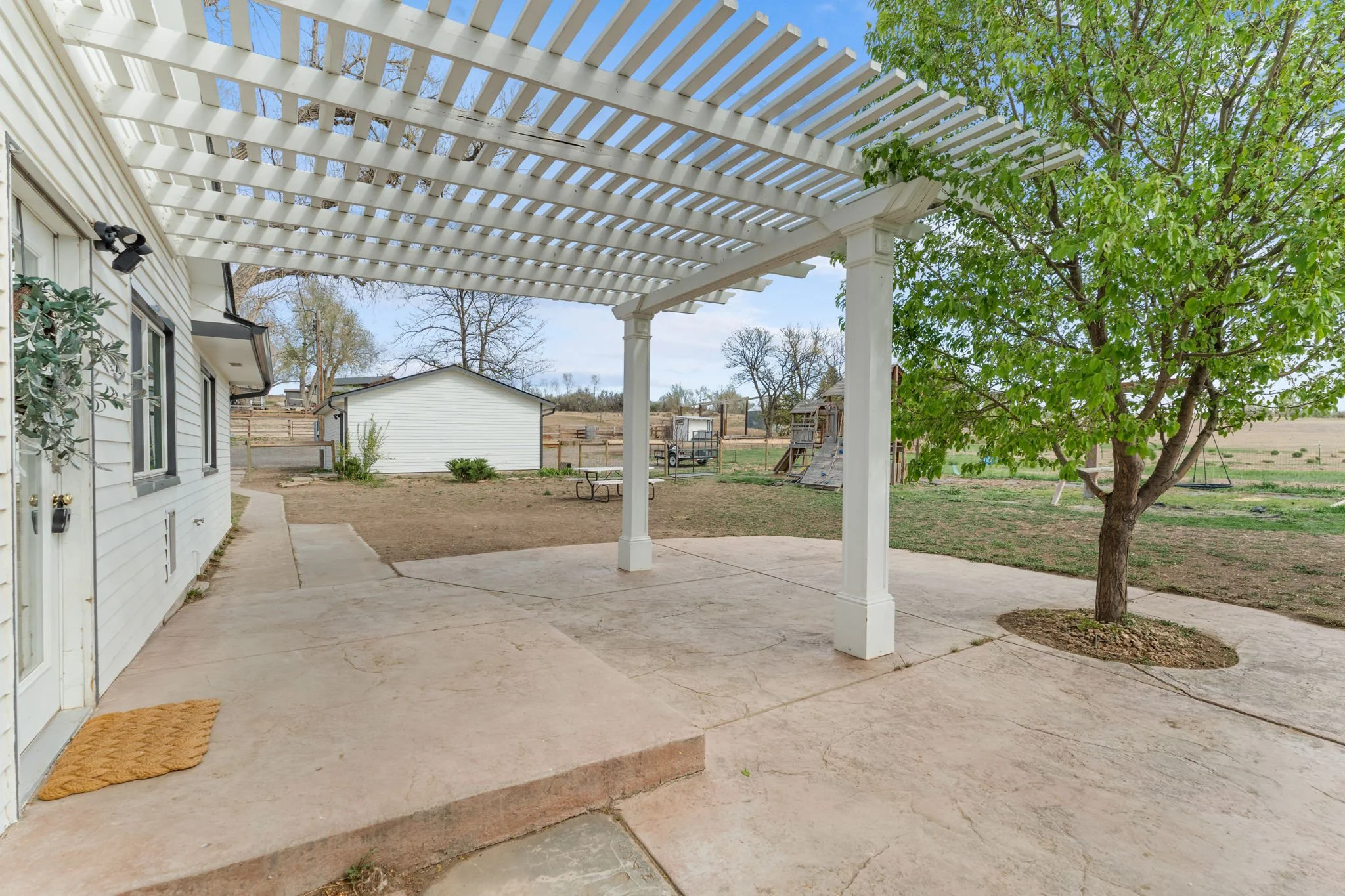 Pergola covered porch