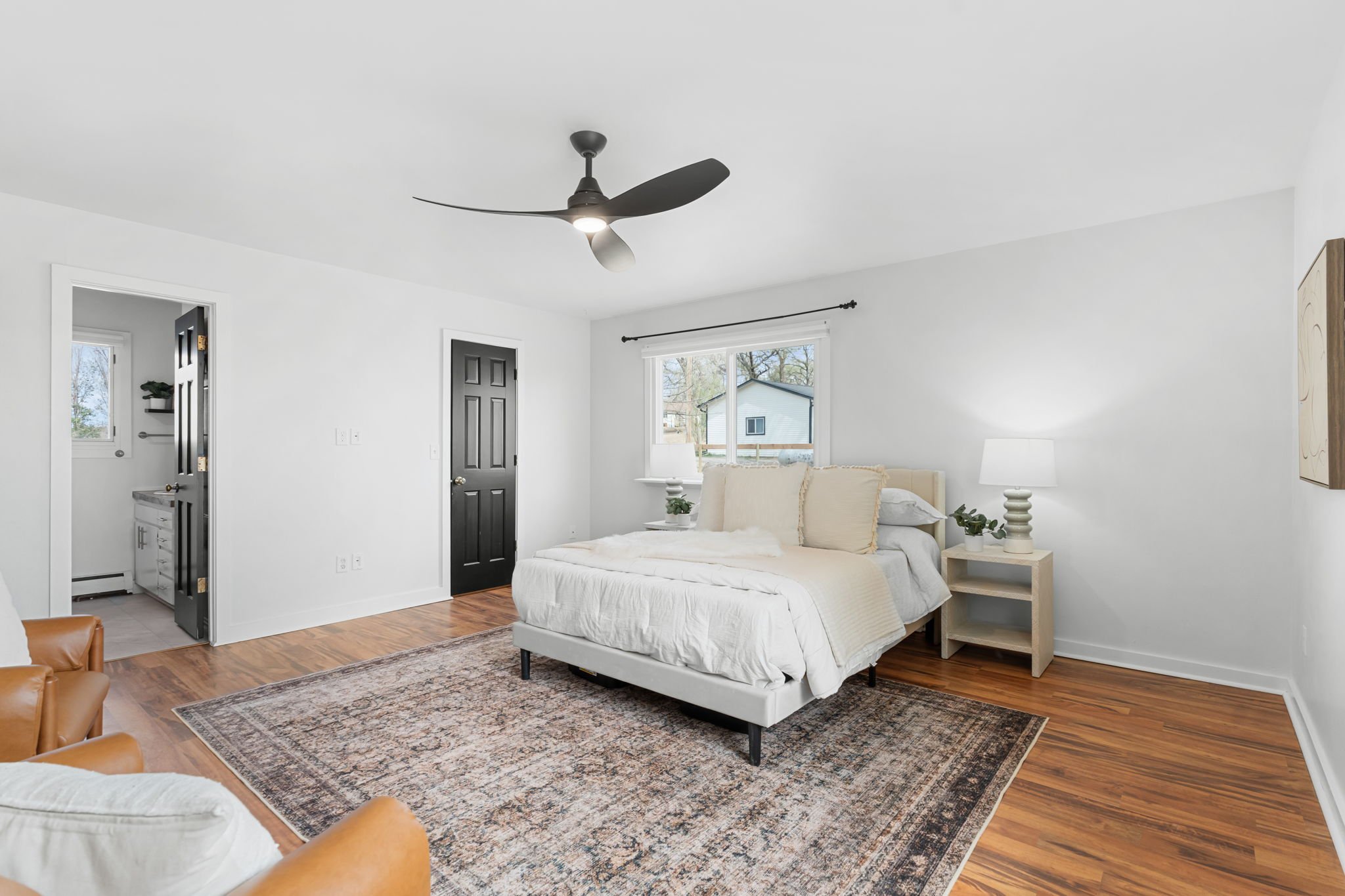 Primary bedroom features an ensuite bathroom & walk-in closet