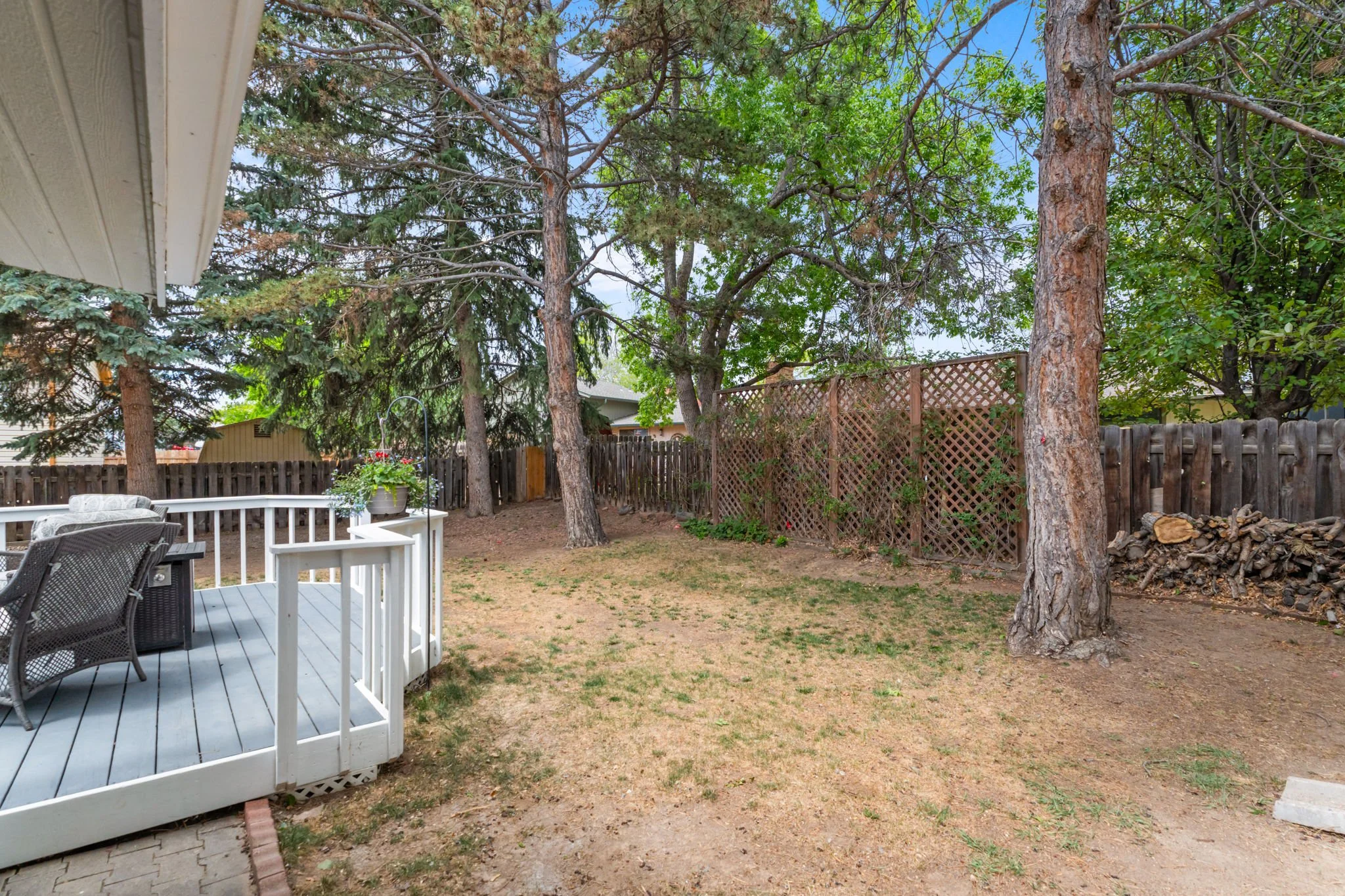 Mature trees and fully fenced-in yard
