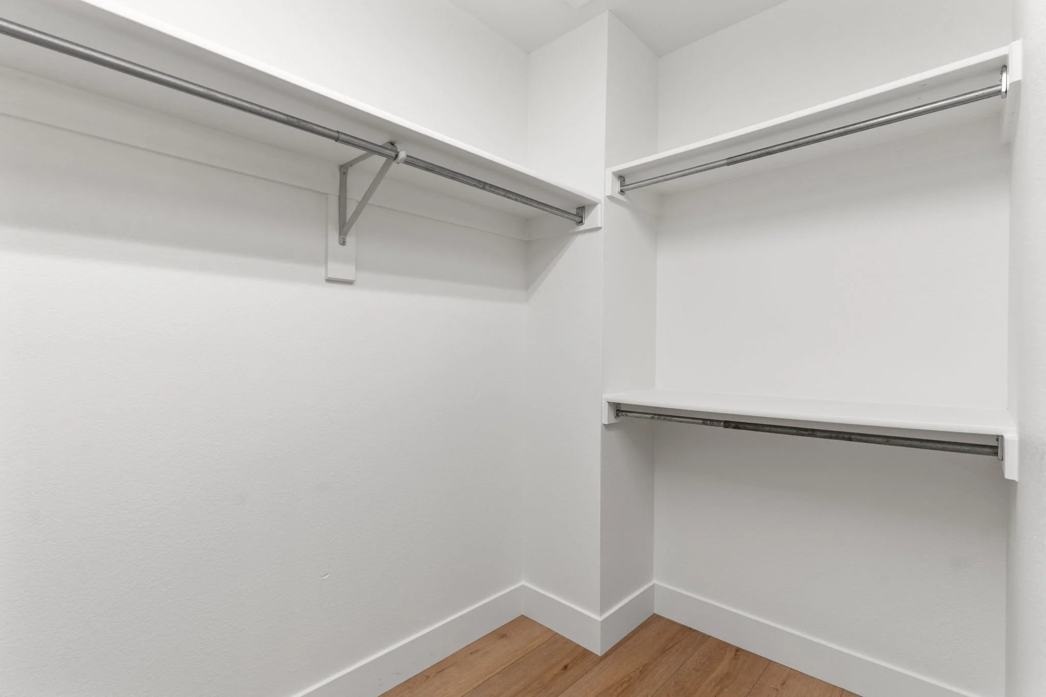 Spacious ensuite walk-in closet in the primary bedroom