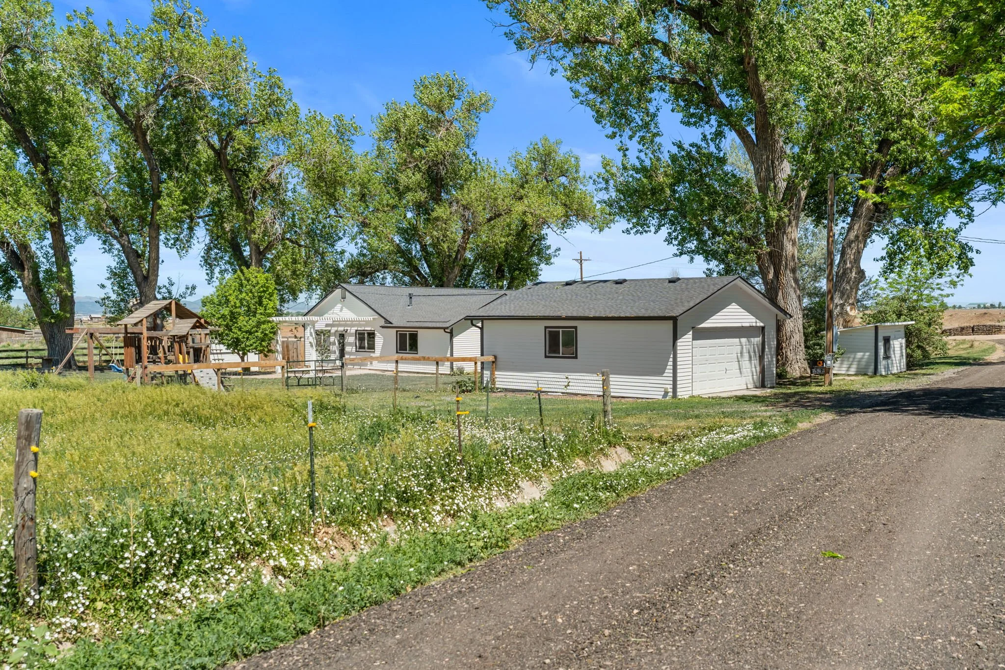 Approximately 2.3 acres with THREE outbuildings (pictured above is outbuilding #1)
