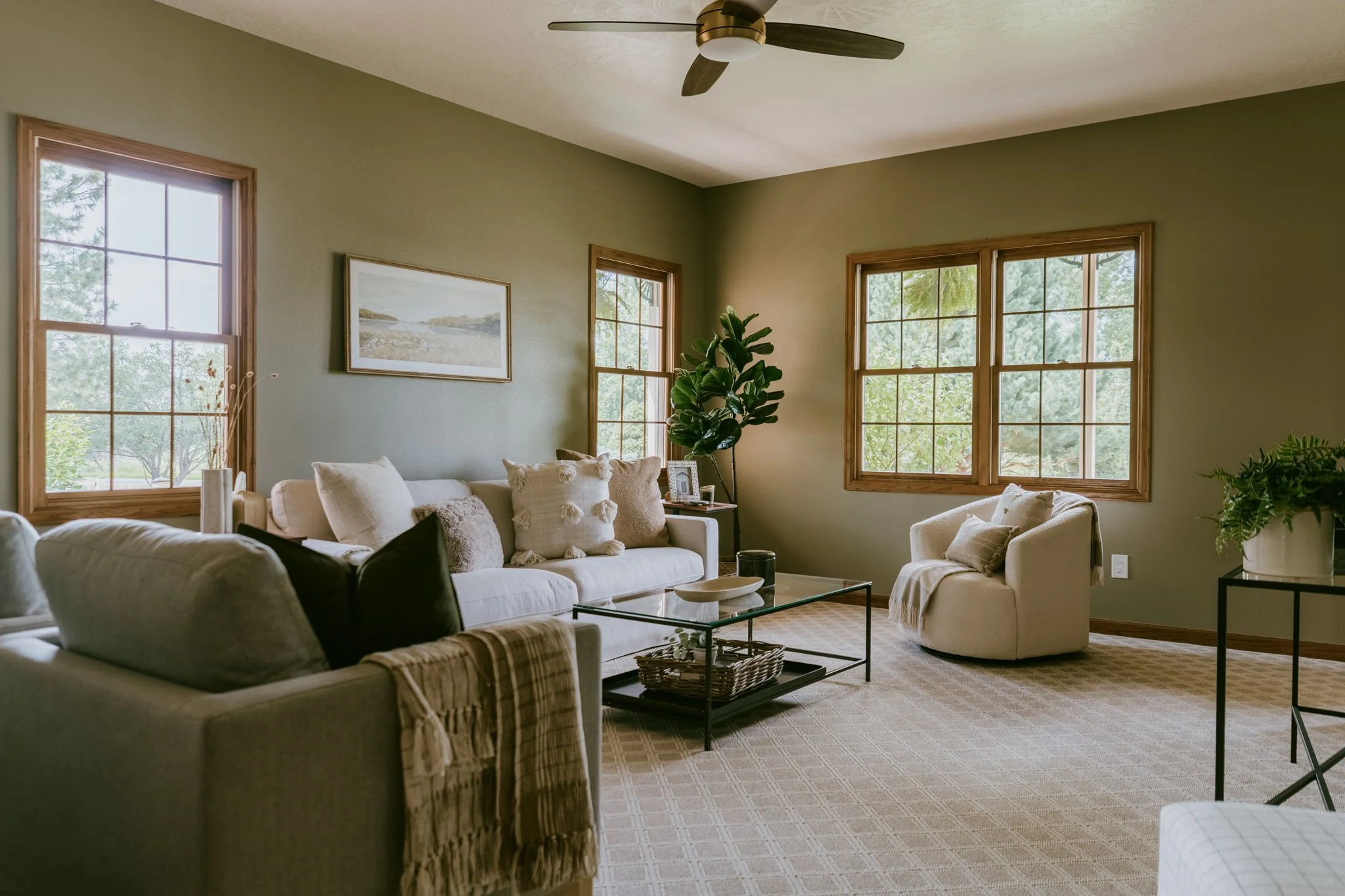 Family room filled with natural light and views