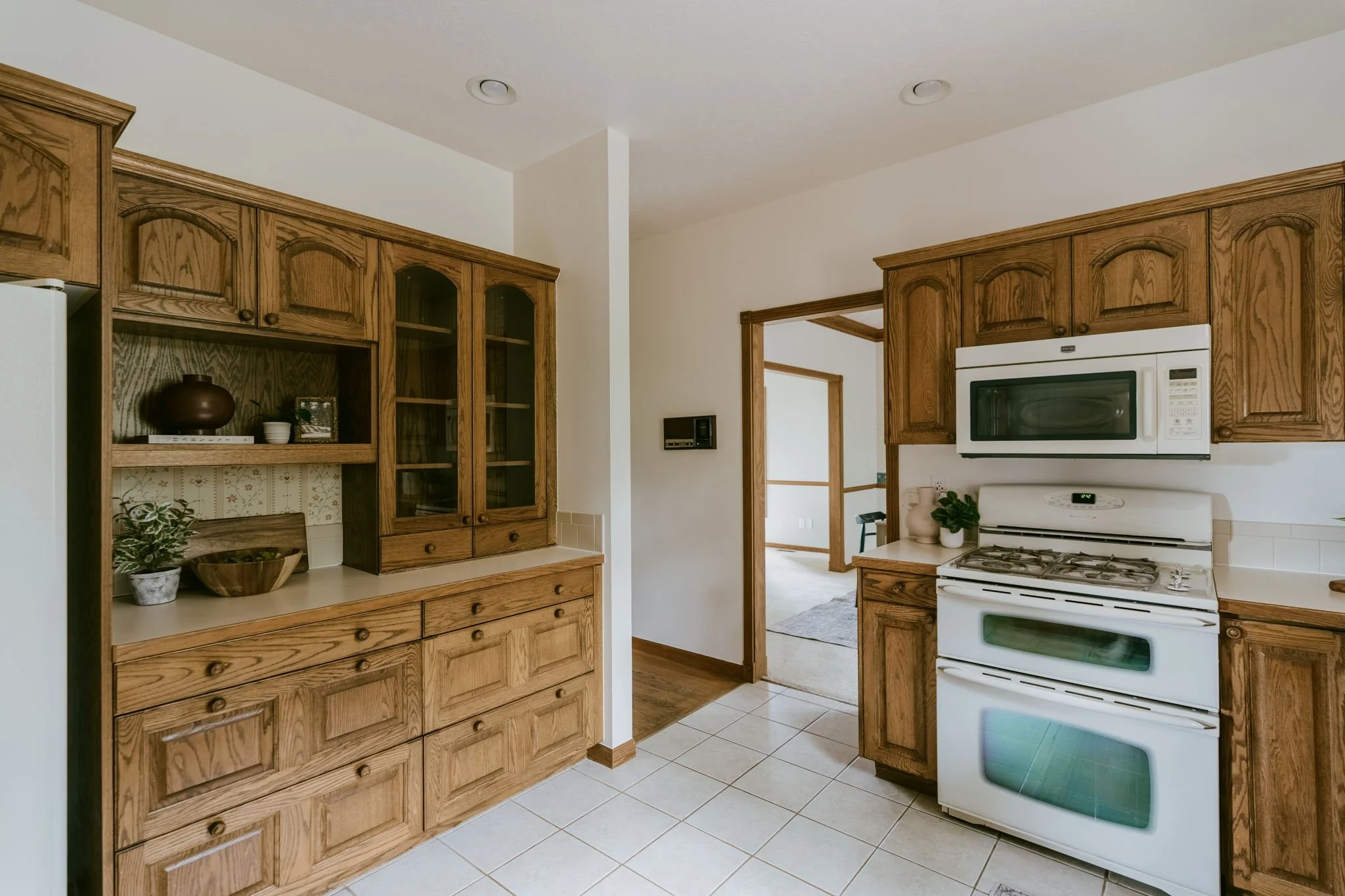 Incredible cabinet space w/ drawers and coffee bar area