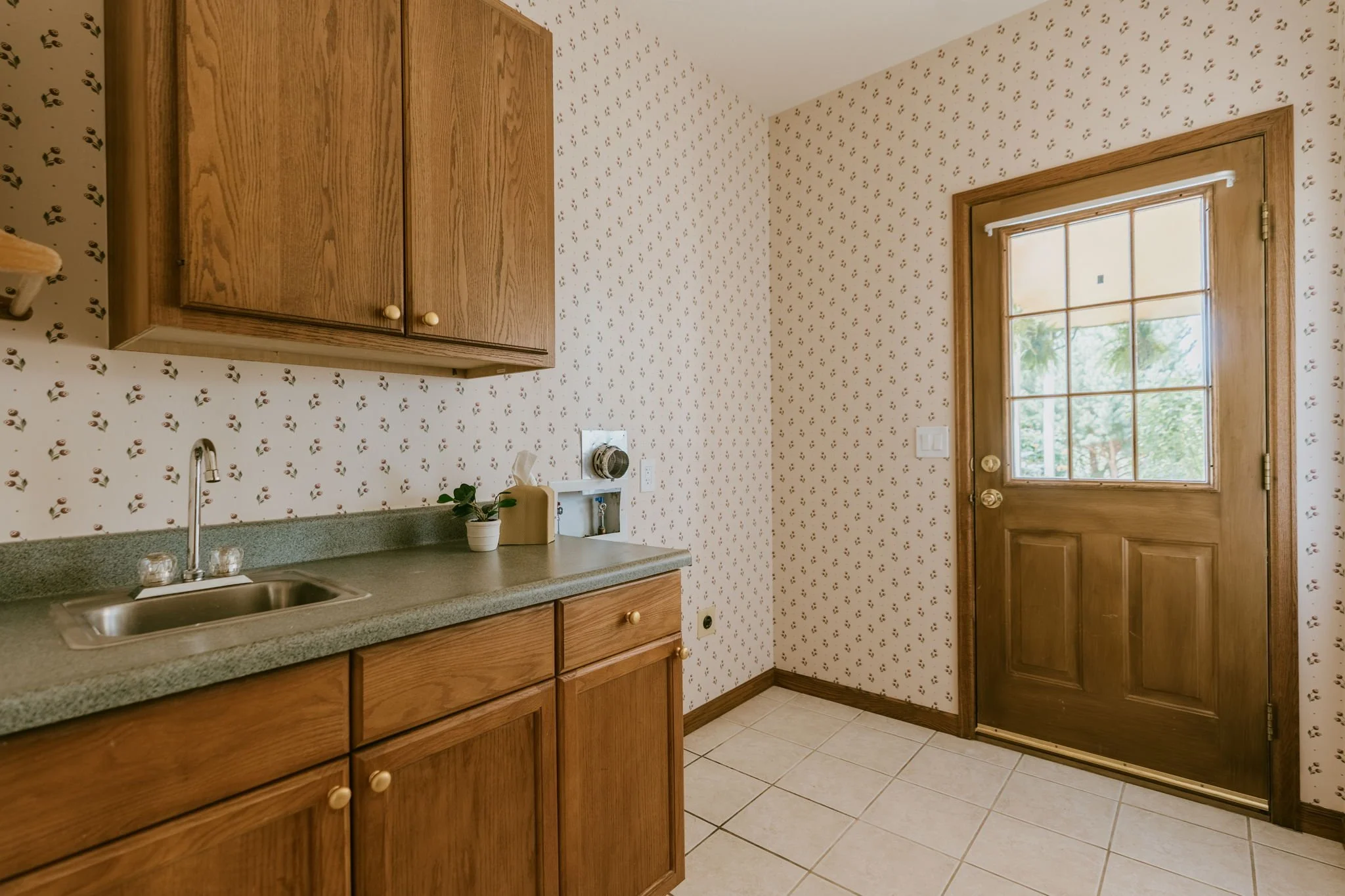 Adjacent main level laundry and separate entry