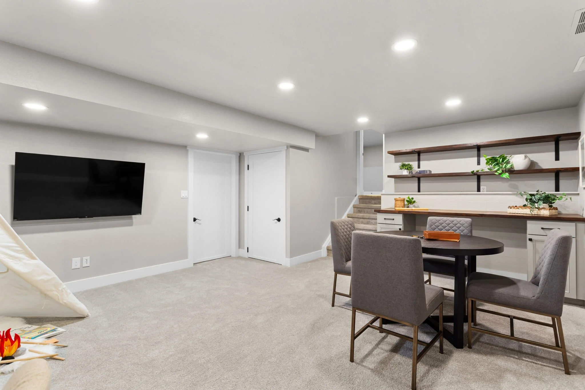 Spacious Family Room with Built-Ins & Storage Room