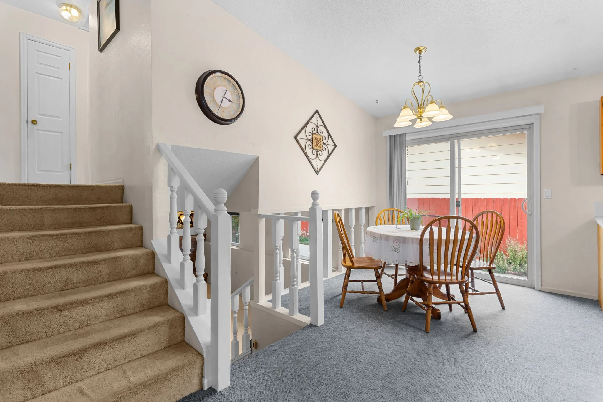 Stairs to the Primary Bedroom, Bathroom & Two Additional Bedrooms