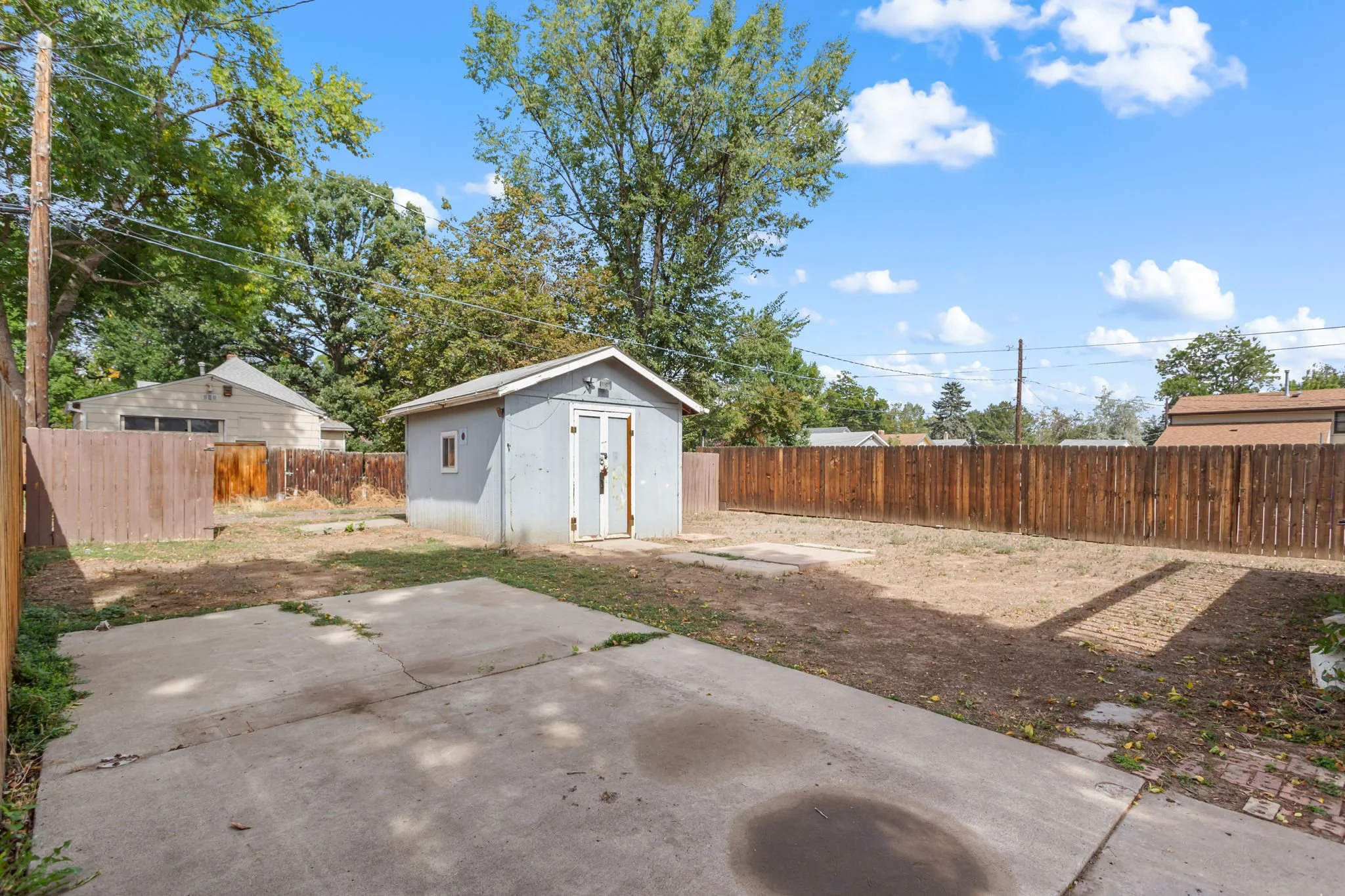 Keep The Backyard Shed Or Replace It With A Garage
