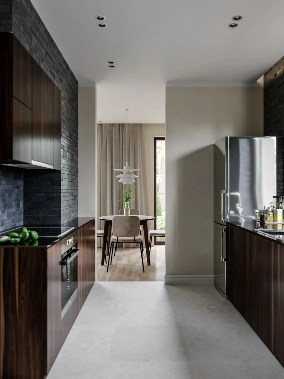Modern kitchen with dark wood cabinets, black brick backsplash, stainless steel refrigerator, light-colored floor, and a view of an adjacent dining area with a round table, beige chairs, and a pendant light, with large windows and sheer curtains.