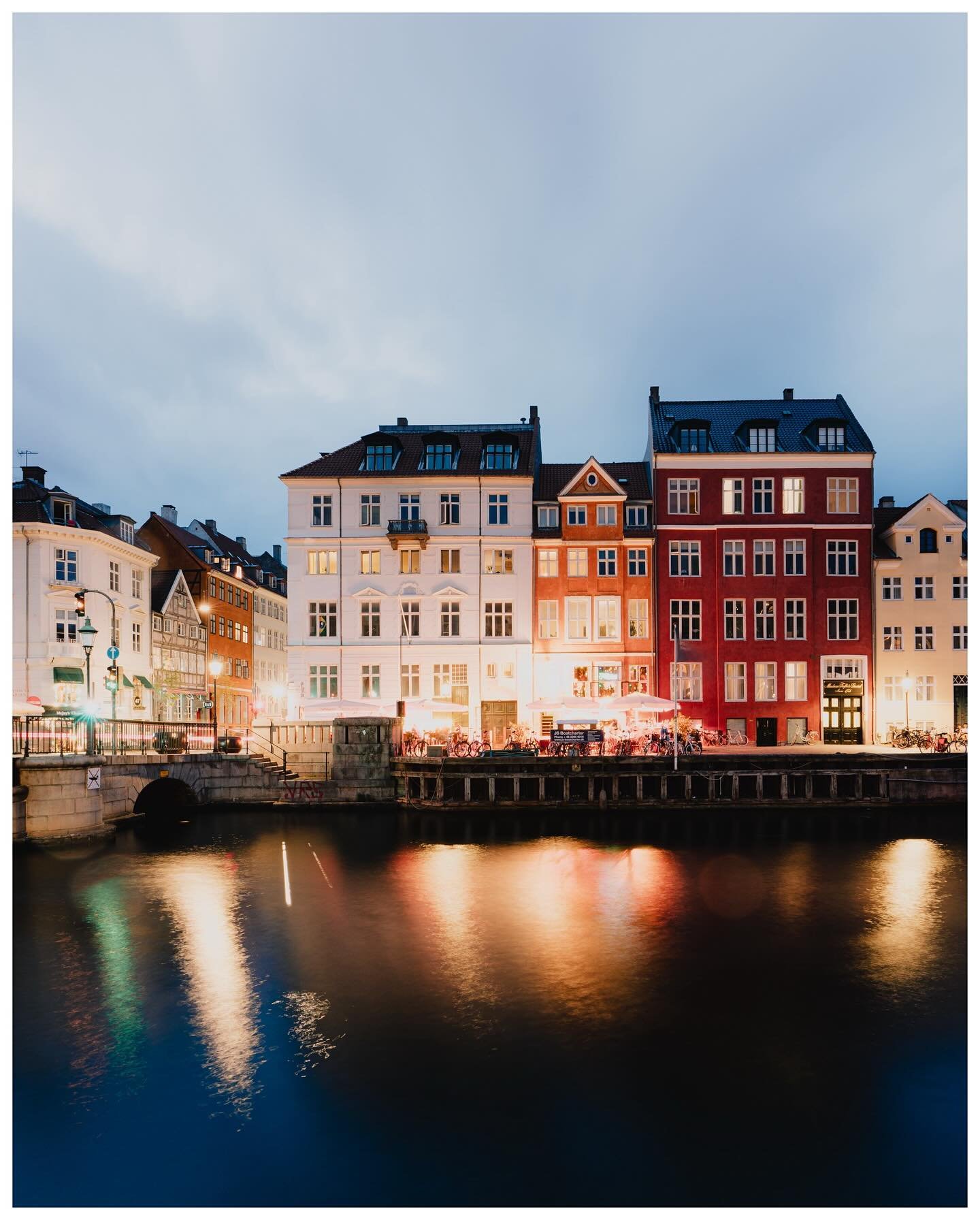 Copenhagen blue hour #Copenhagen #Denmark #layover 
.
.
.
.
.
#film #35mm #portra400 #city #cityscapes #bluehour #longexposure #moody #igtravel #igdaily #earthminimal #stademagazine #woofermagazine #condenasttraveller #somelightmag #eyeshotmag #allis