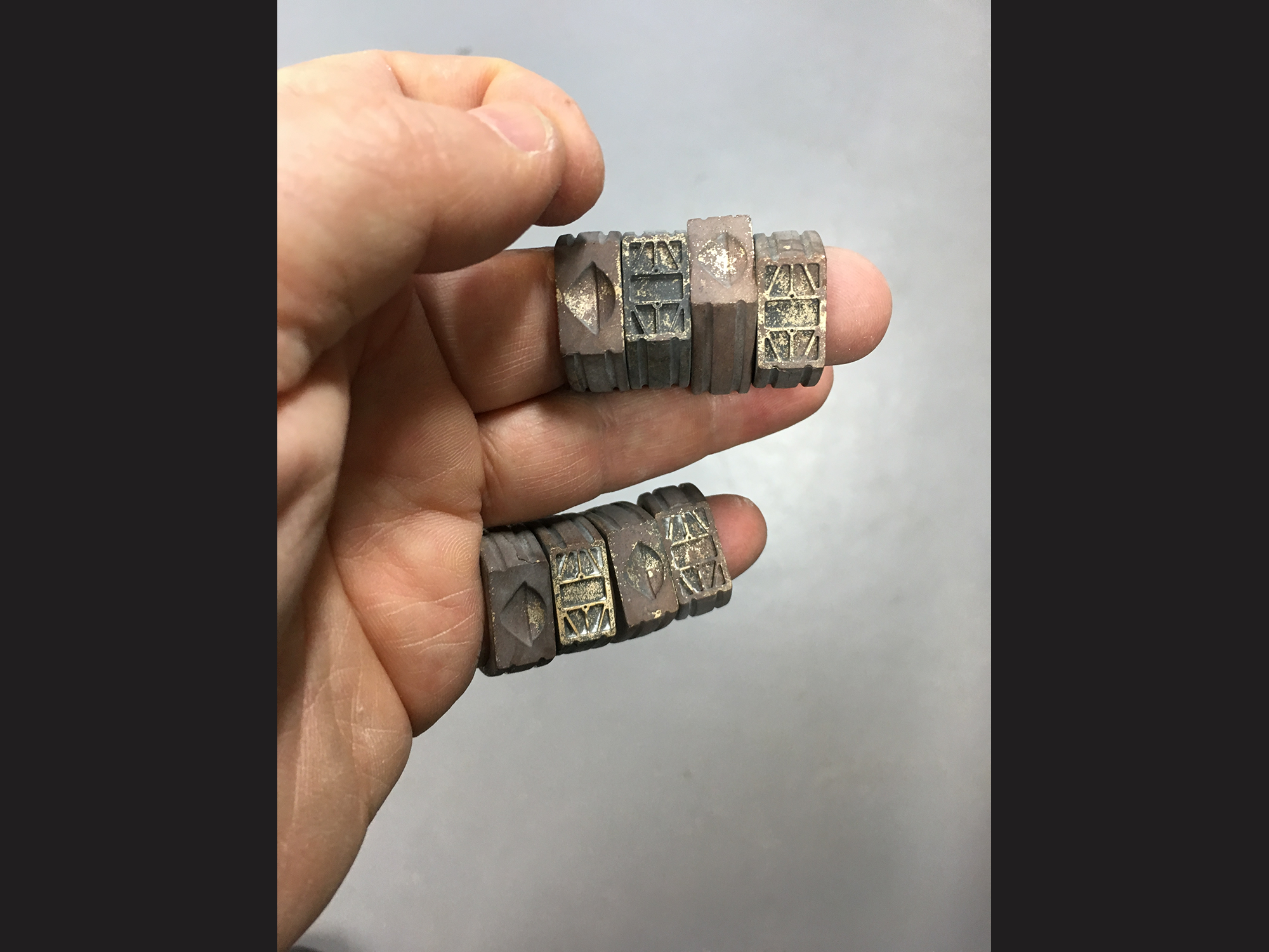 bronze-on-fingers.png