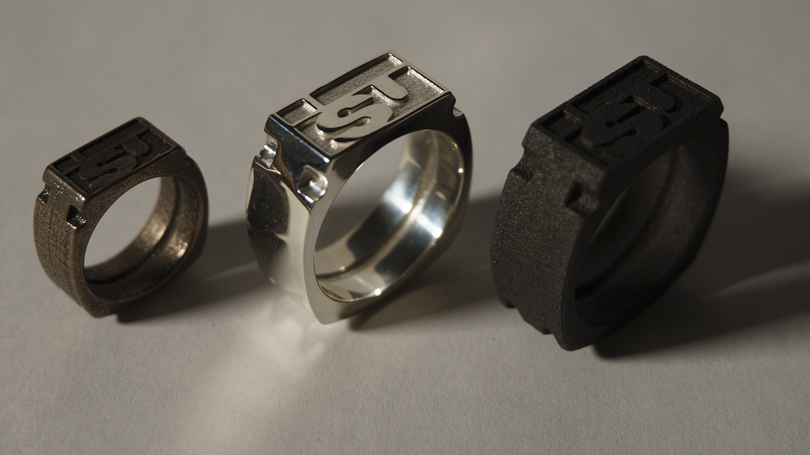 bronze-steel, polished silver, black-steel versions
