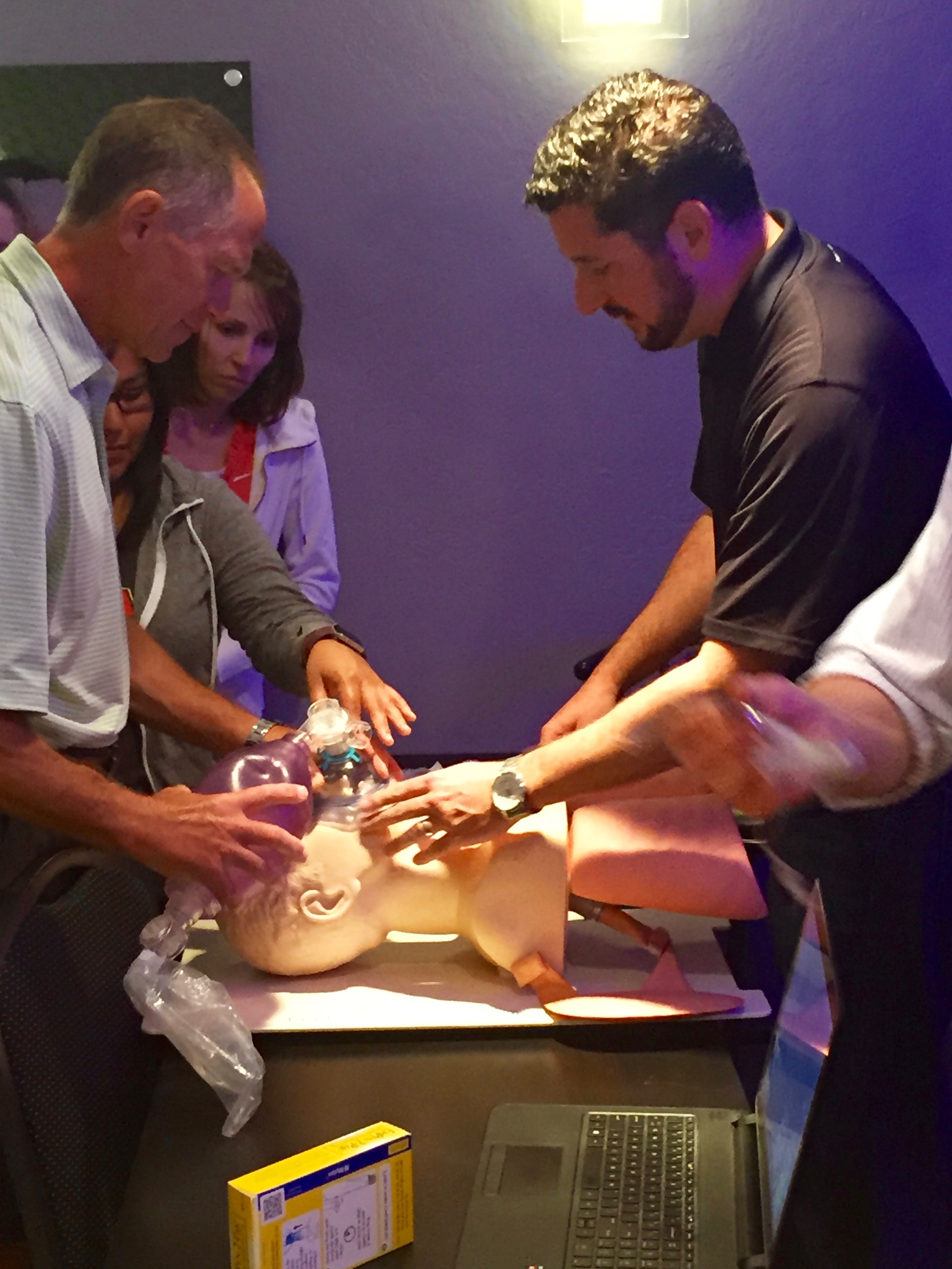  Ali J. Baghai, CRNA, demonstrating airway management techniques. &nbsp;Pictured here with Dr. Jorgenson, DDS. &nbsp; 