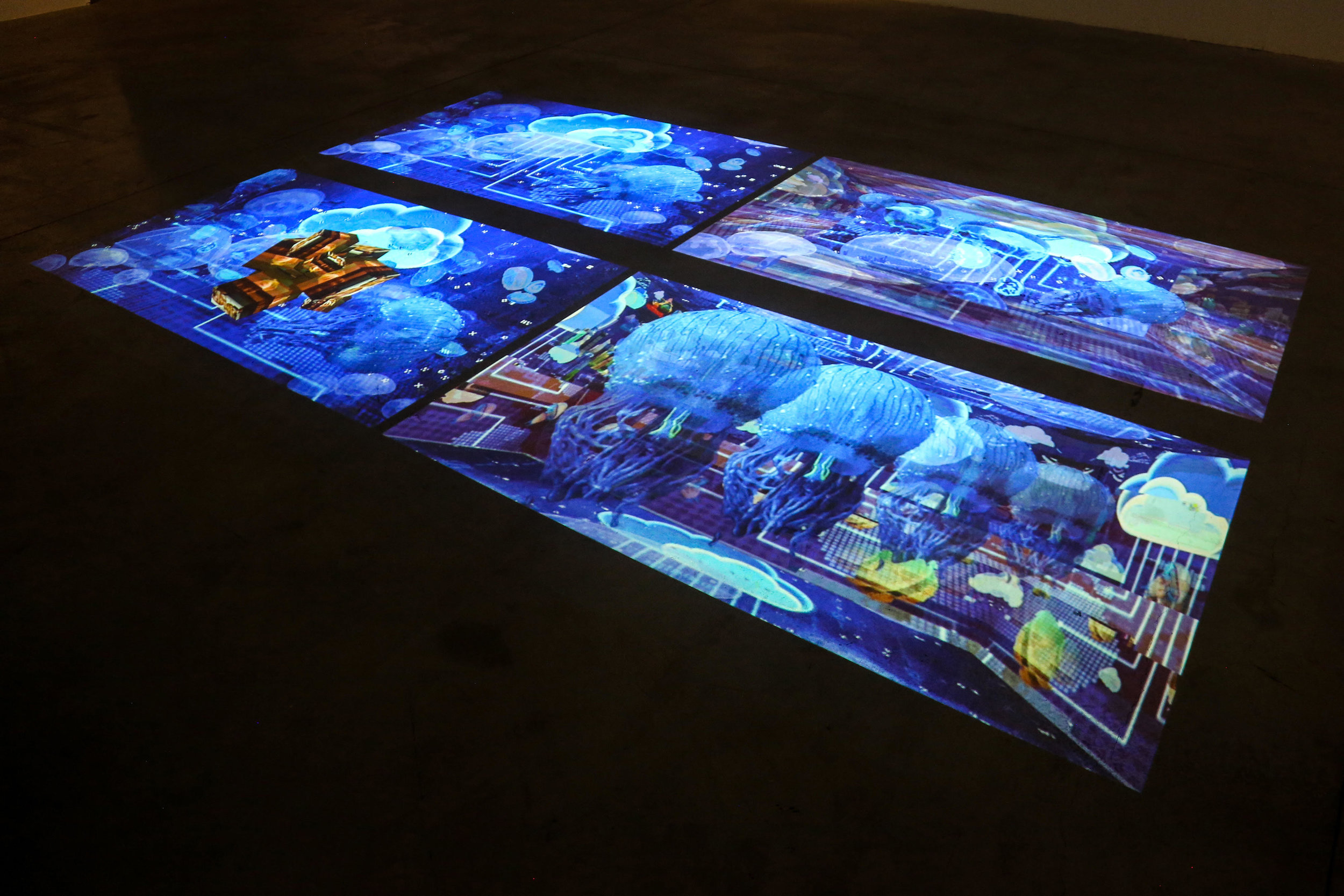 Colonise the Cloud , Gretta Louw, series of animated GIFs as floor projection, 2016, installation view at LABoral in Gijón, Spain. Photo courtesy of Michael Erglis.