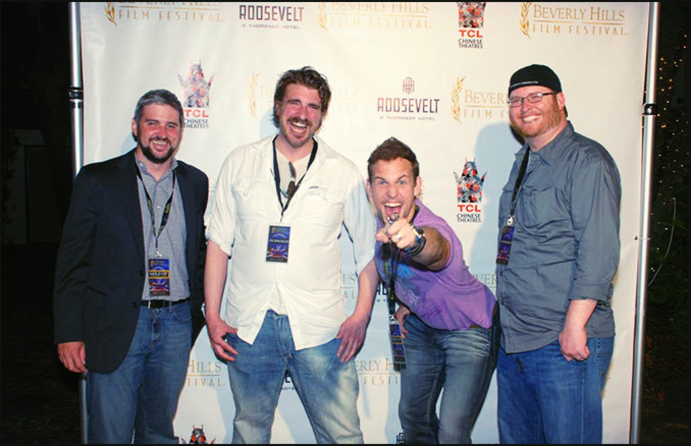  (from left to right)  Mike Collier II (Director of Photography), Levi A. Taylor (Co-Writer/Director), Bradford James Jackson (Co-Star Actor) D.K. Johnstorn (Co--Producer)  The Darkness premier at Beverly Hills Film Festival 