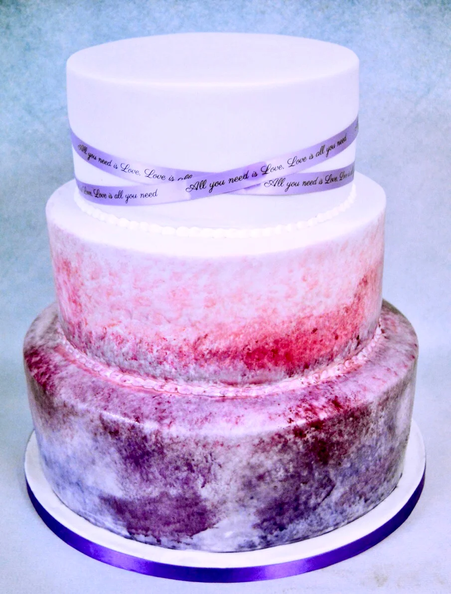 3 tier pink and purple ombre wedding cake