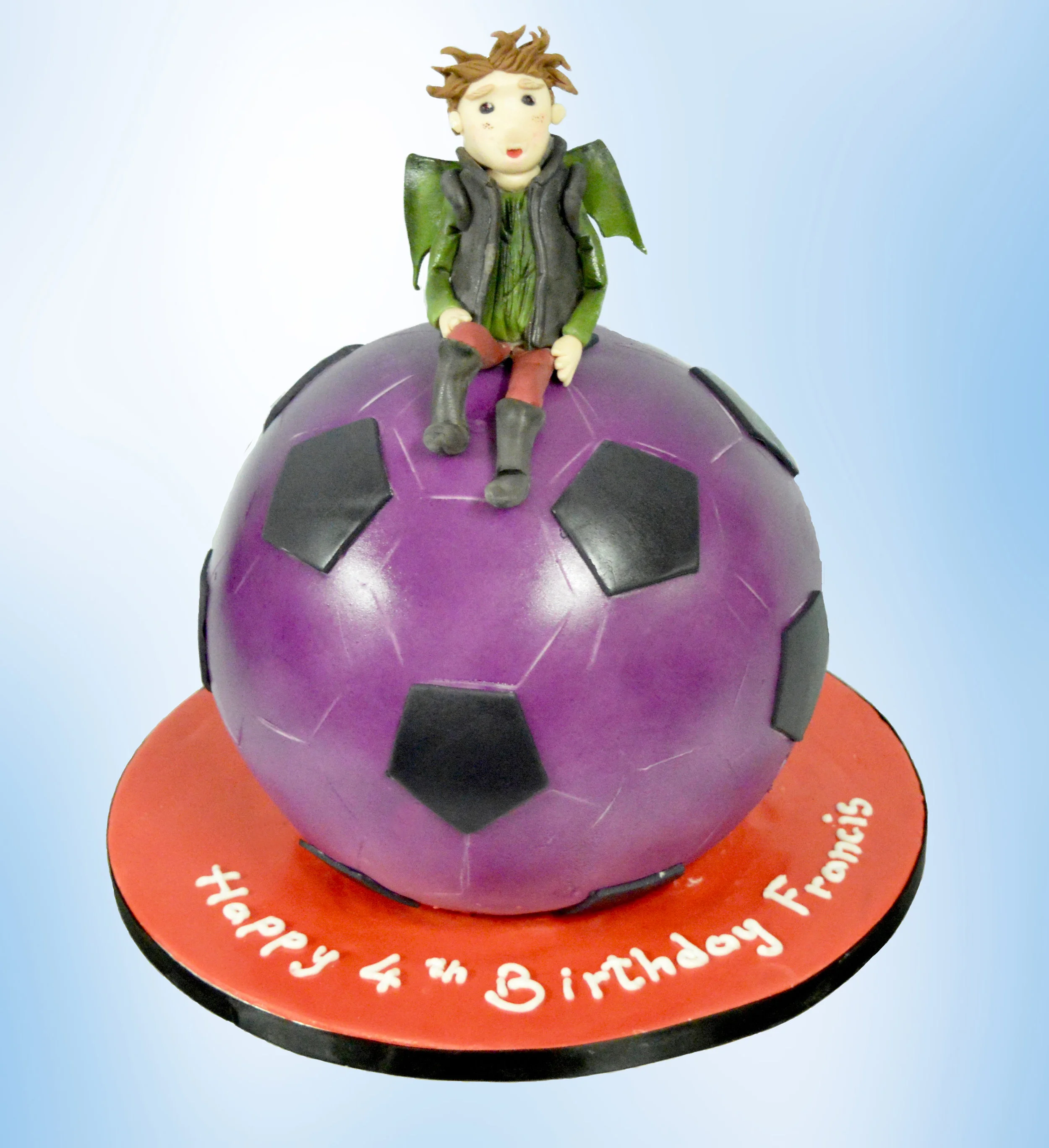 Purple football with child vampire for a 4th birthday