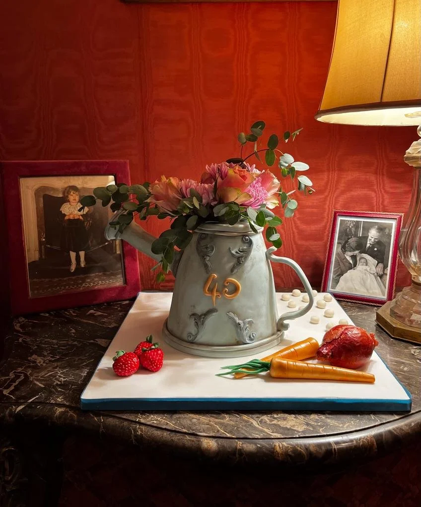 Watering can with flowers and modelling chocolate vegetable cake for a 40th birthday