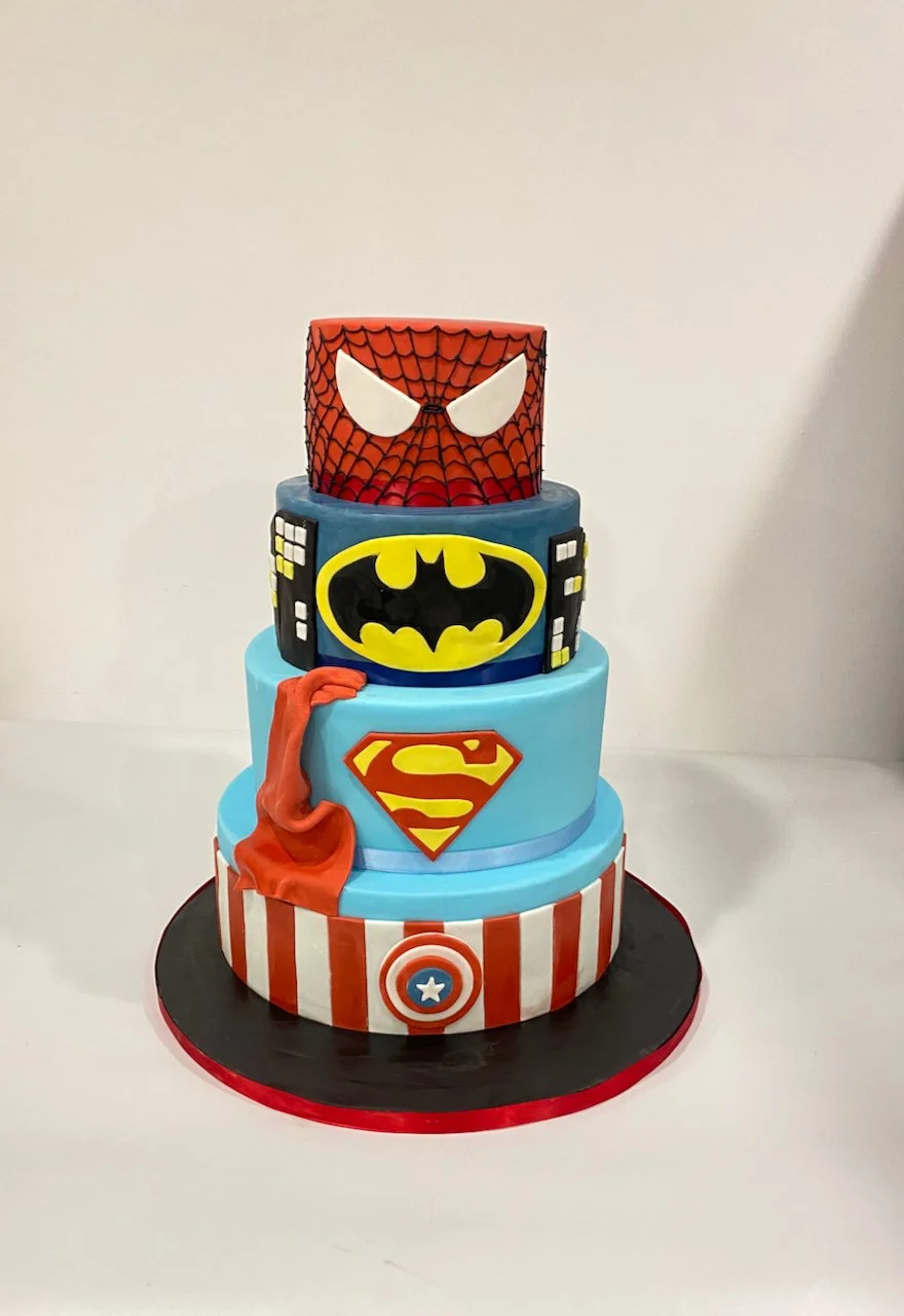 Superhero cake. Avengers, superman, batman and spiderman all on one cake