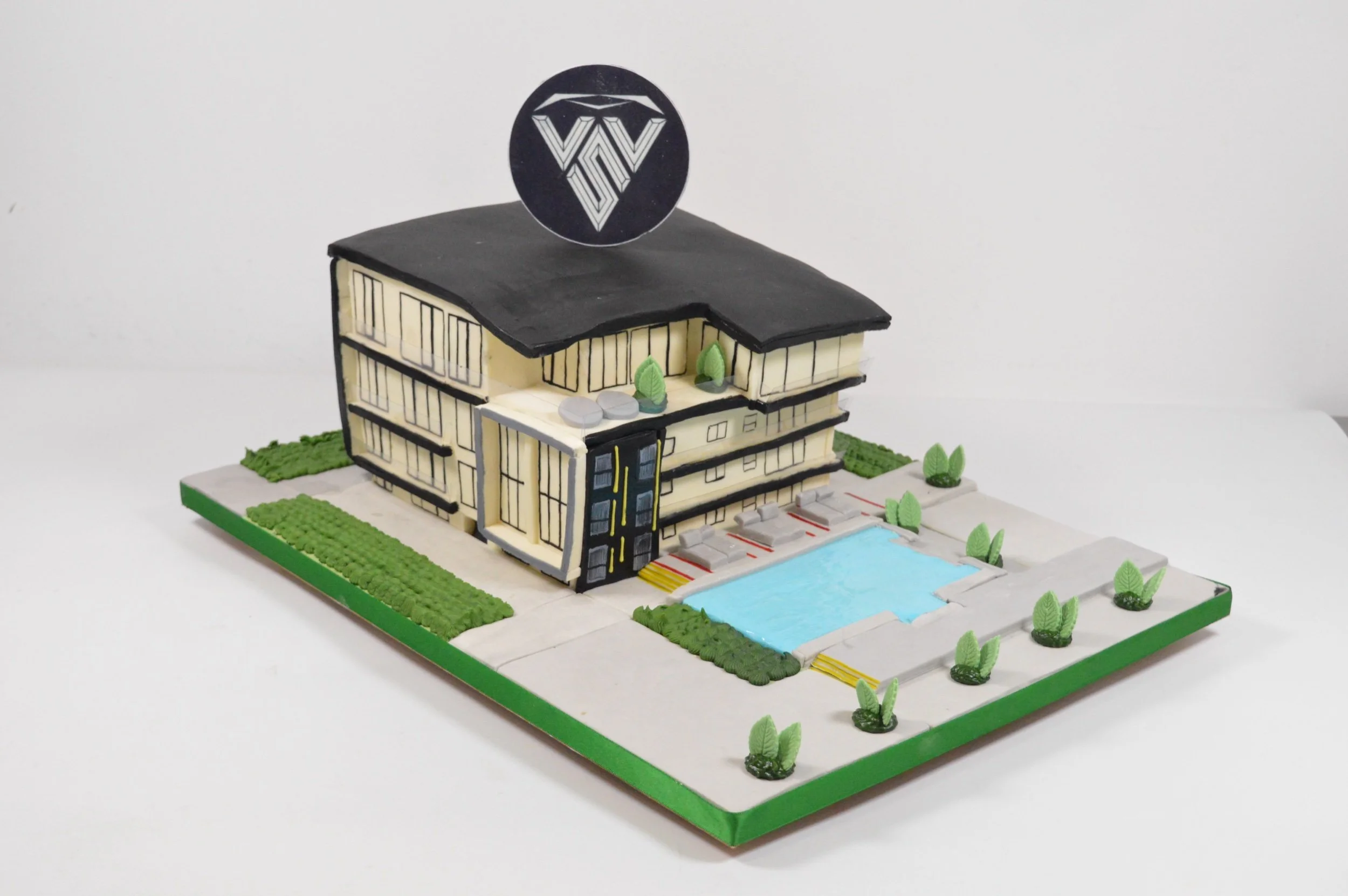 Building replica with swimming pool