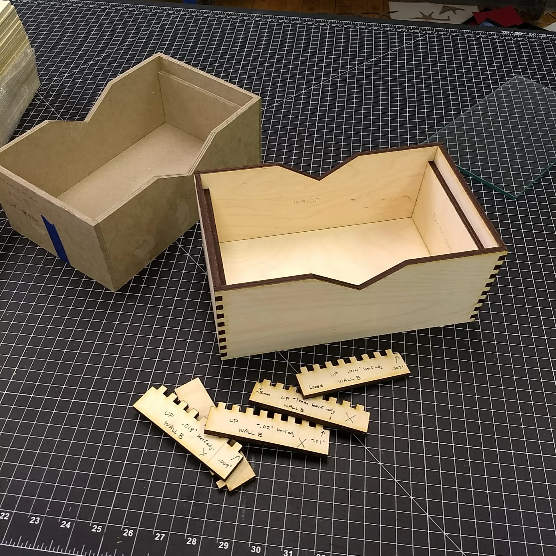 mock-up (left) - prototype (right) - kerf tests (front)
