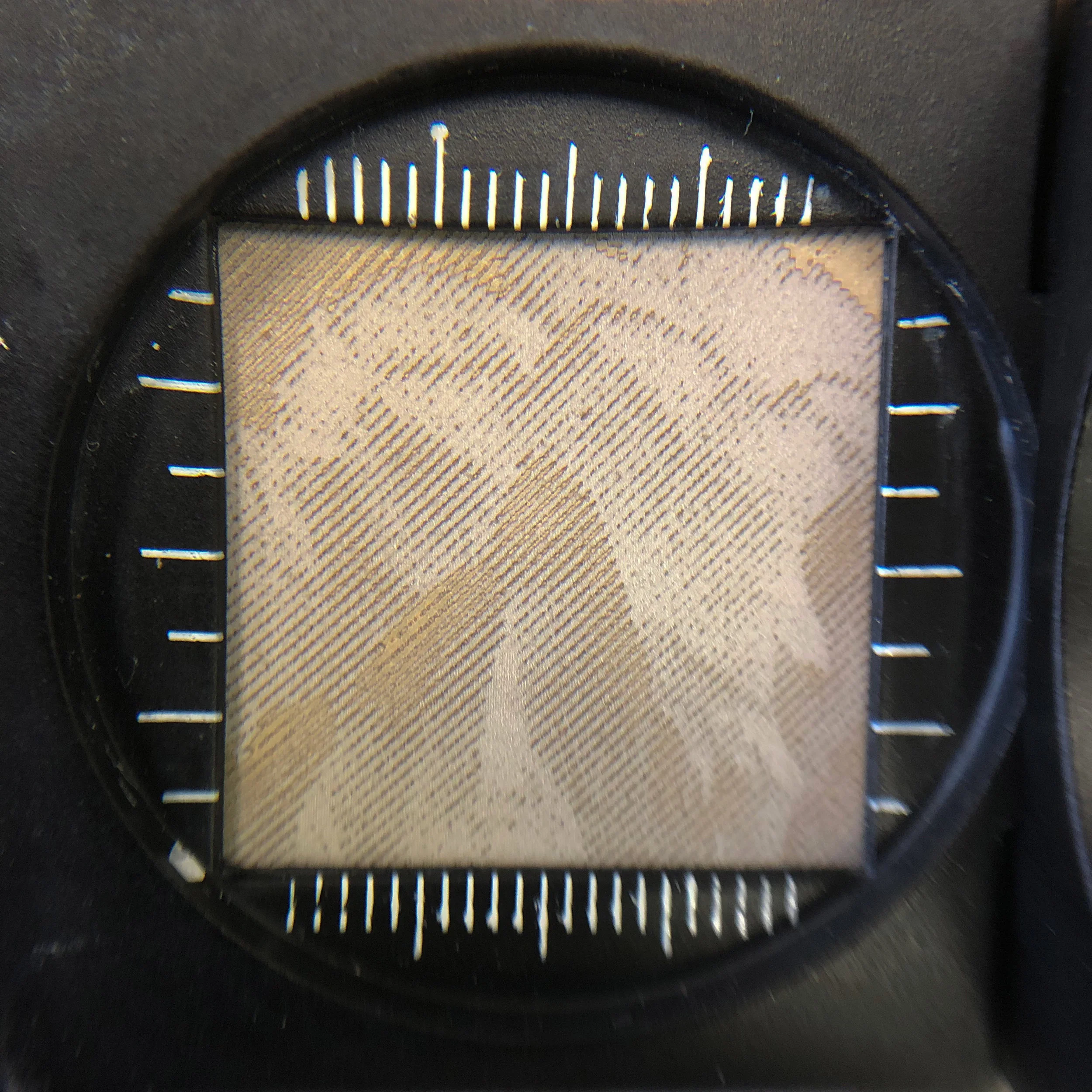 laser engraved stone under magnification