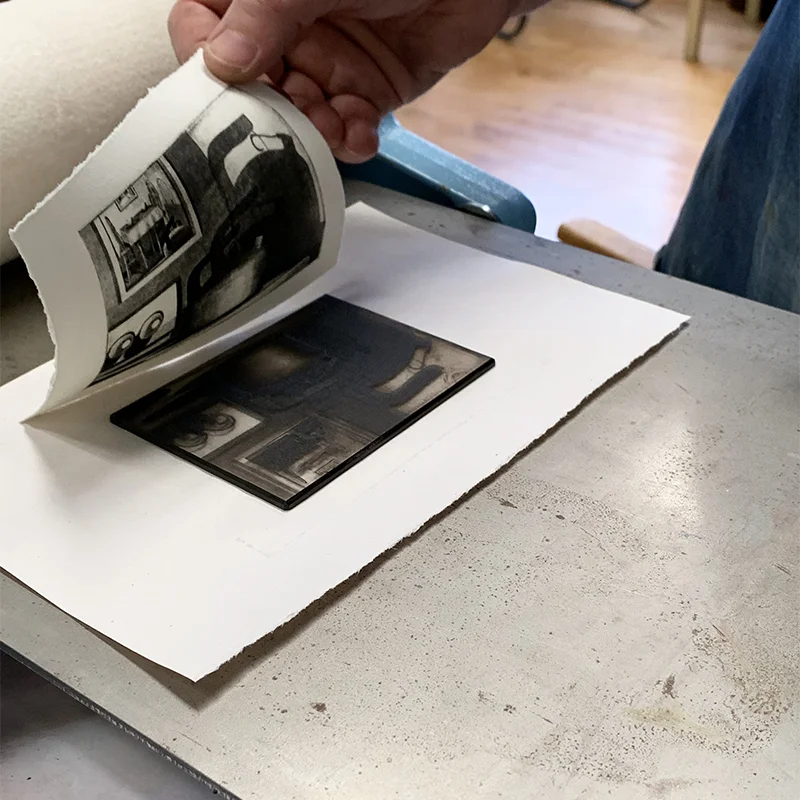 Janet pulling a photo intaglio print.