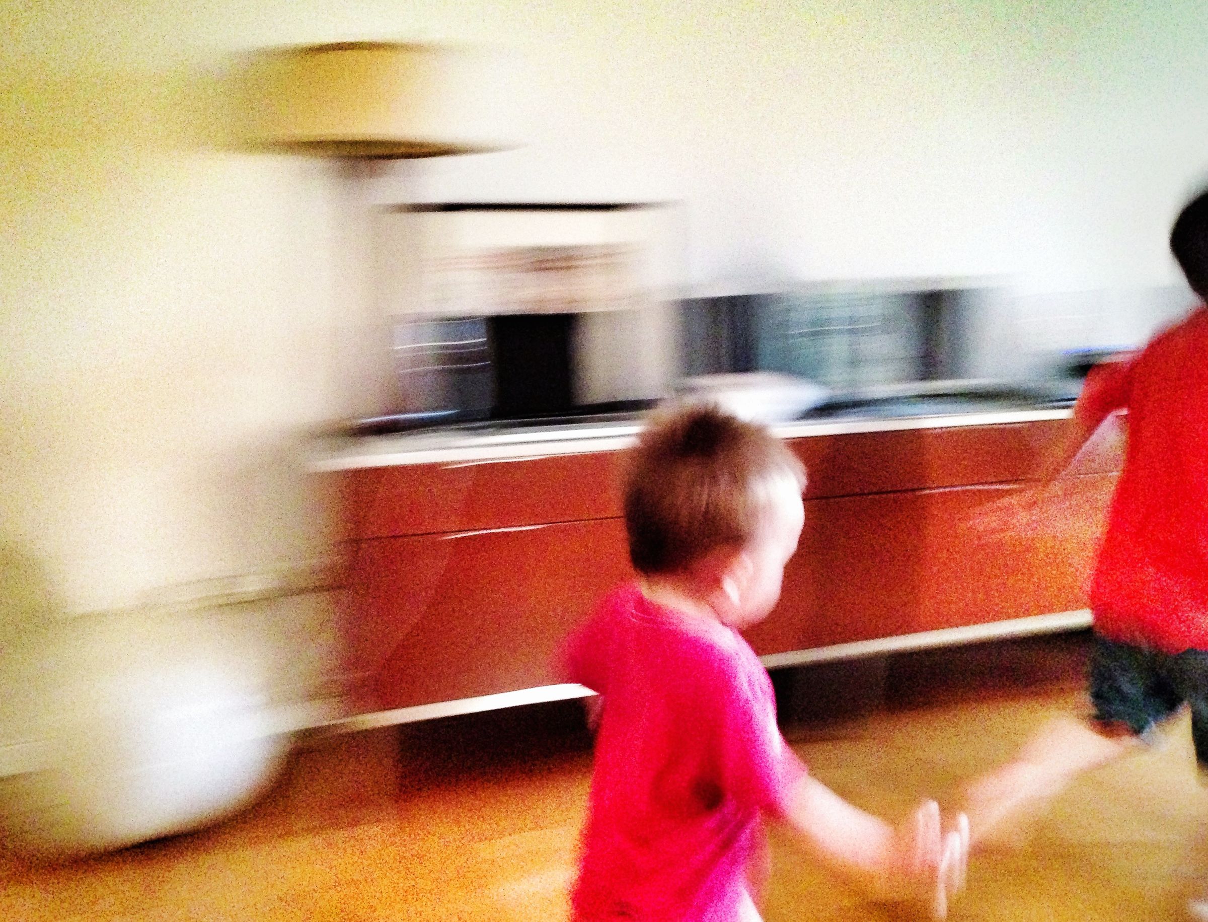 Here I moved my camera with my kids so the background was blurred.