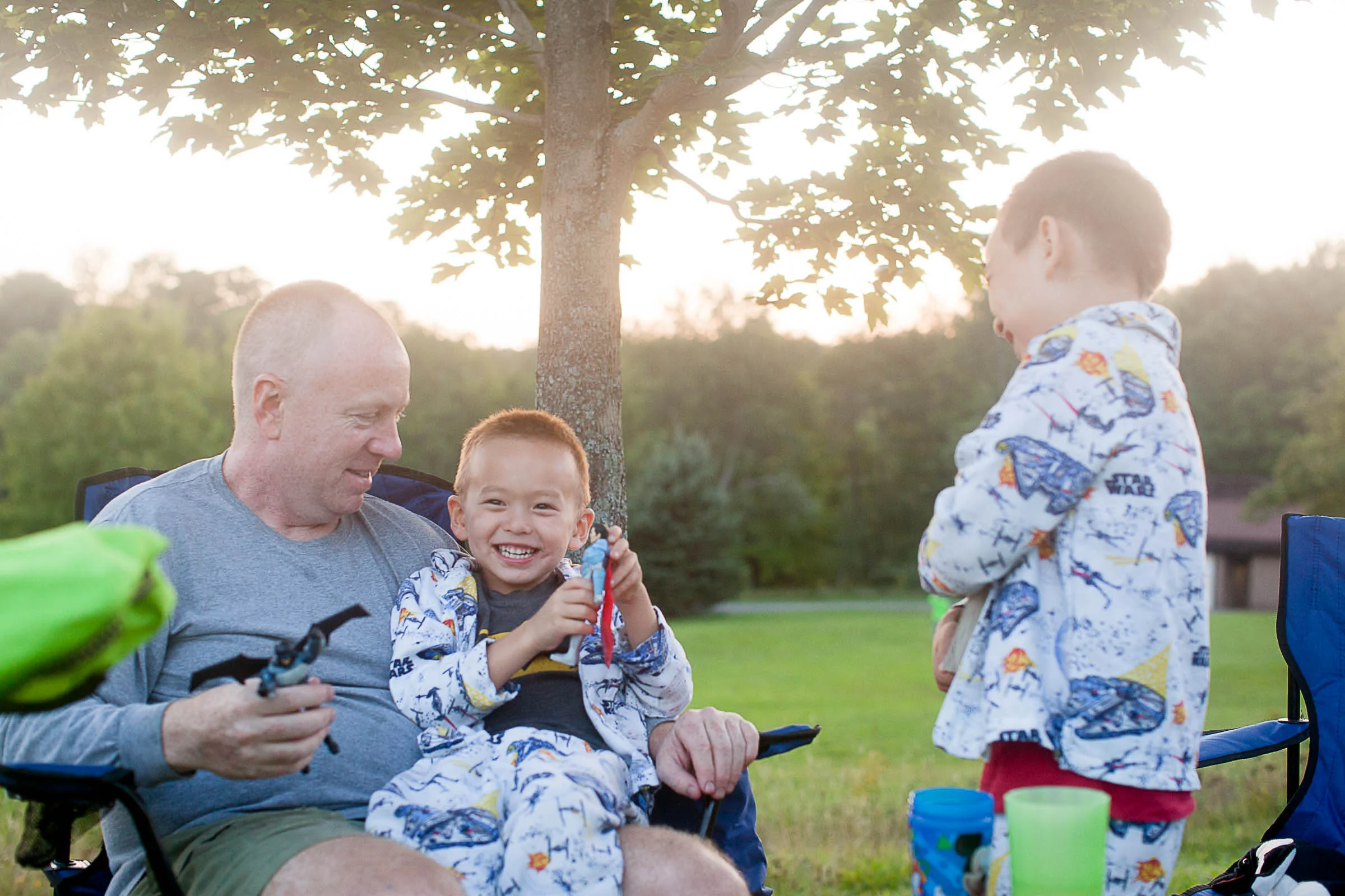 DSLR photo - although not necessarily the "best" technically from our camping trip., but I love the emotions captured here. Although I am not in the photo visually, it remind me of the four of us sitting around talking, laughing and playing after dinner.