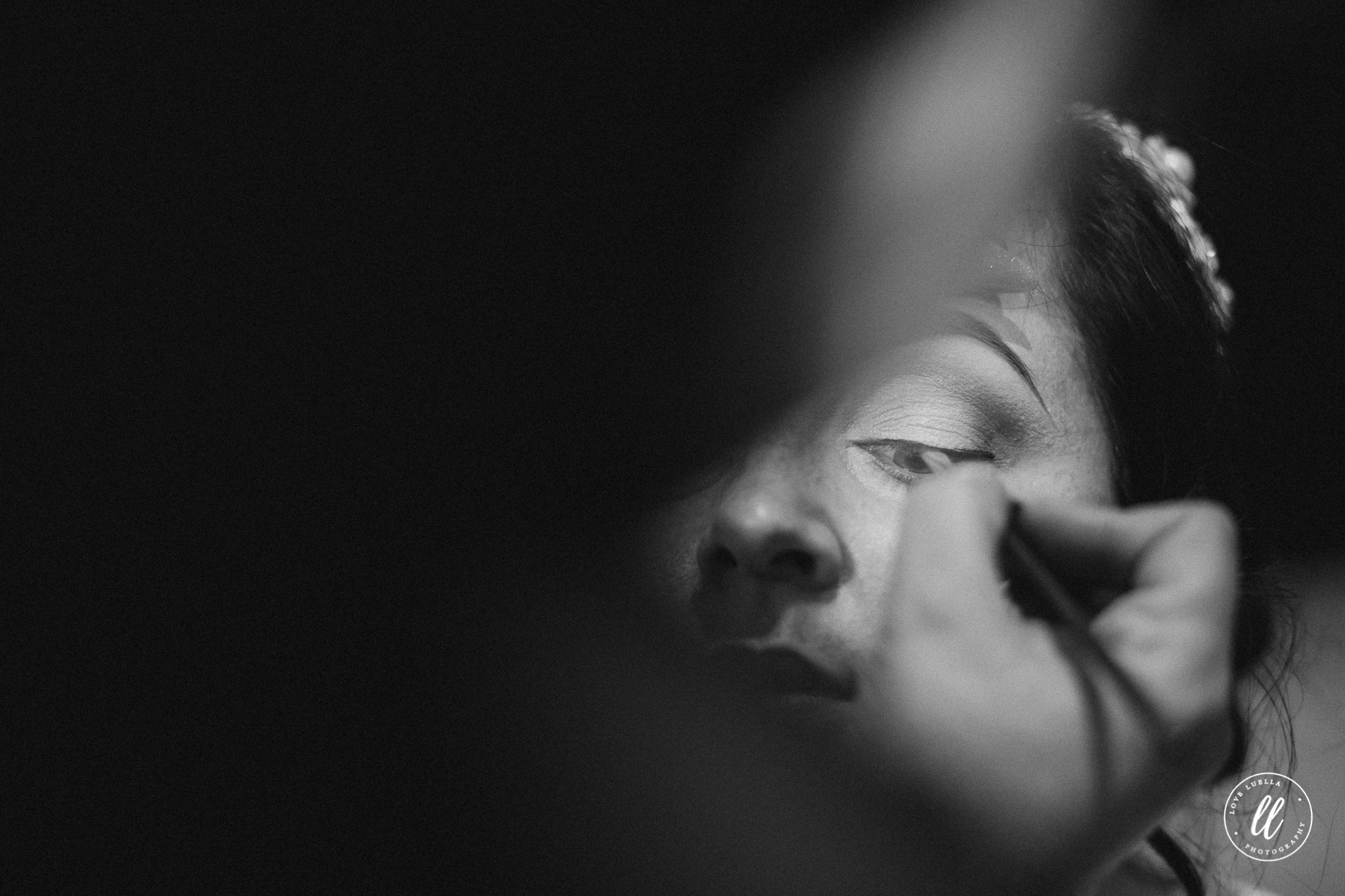 creative image depicting eyeliner application in wedding prep