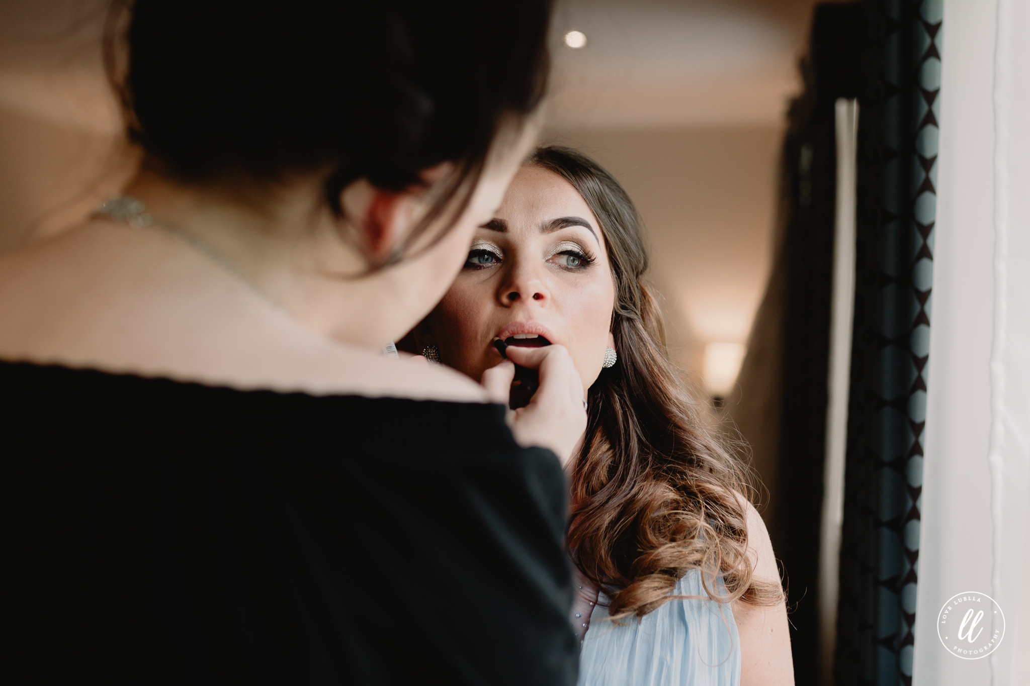 Lipstick application by Pin Ups Rhyl on one of the adult bridesmaids