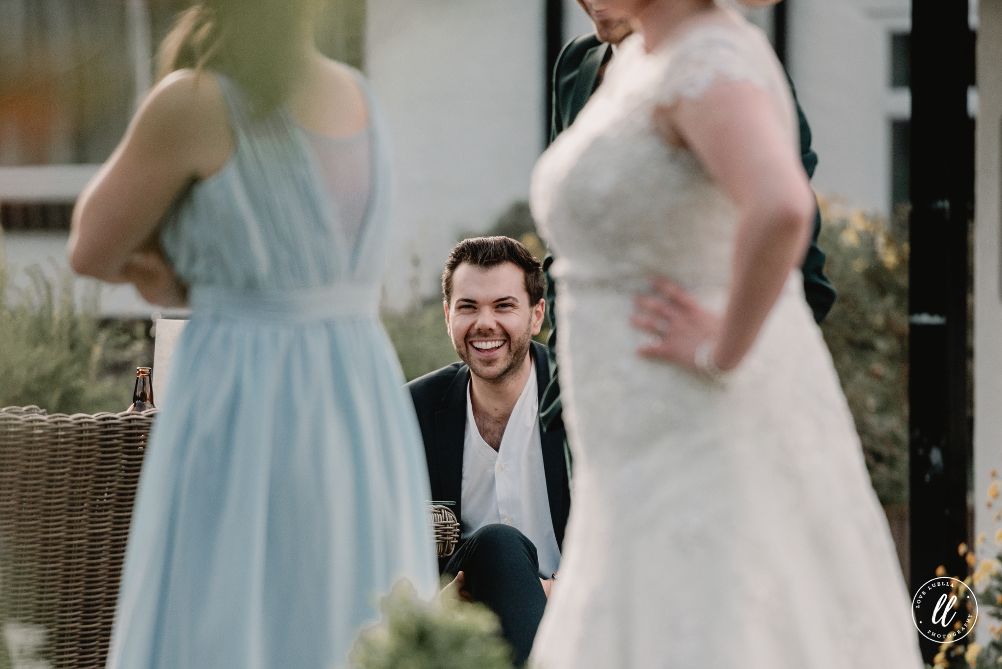 A candid image of one of the guests laughing at a good joke