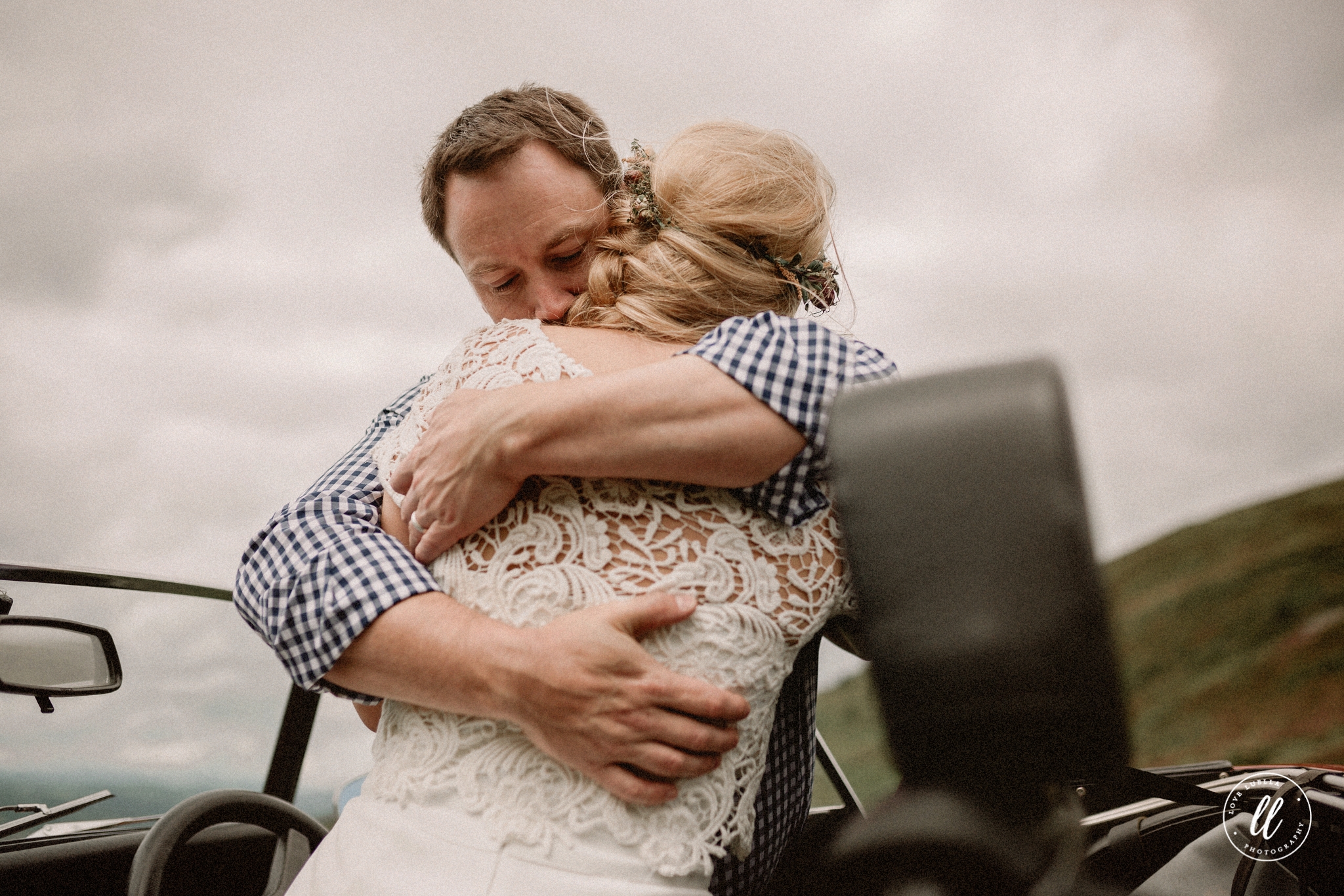 Couple Embracing On Top Of A Mountain In Ruthin North Wales