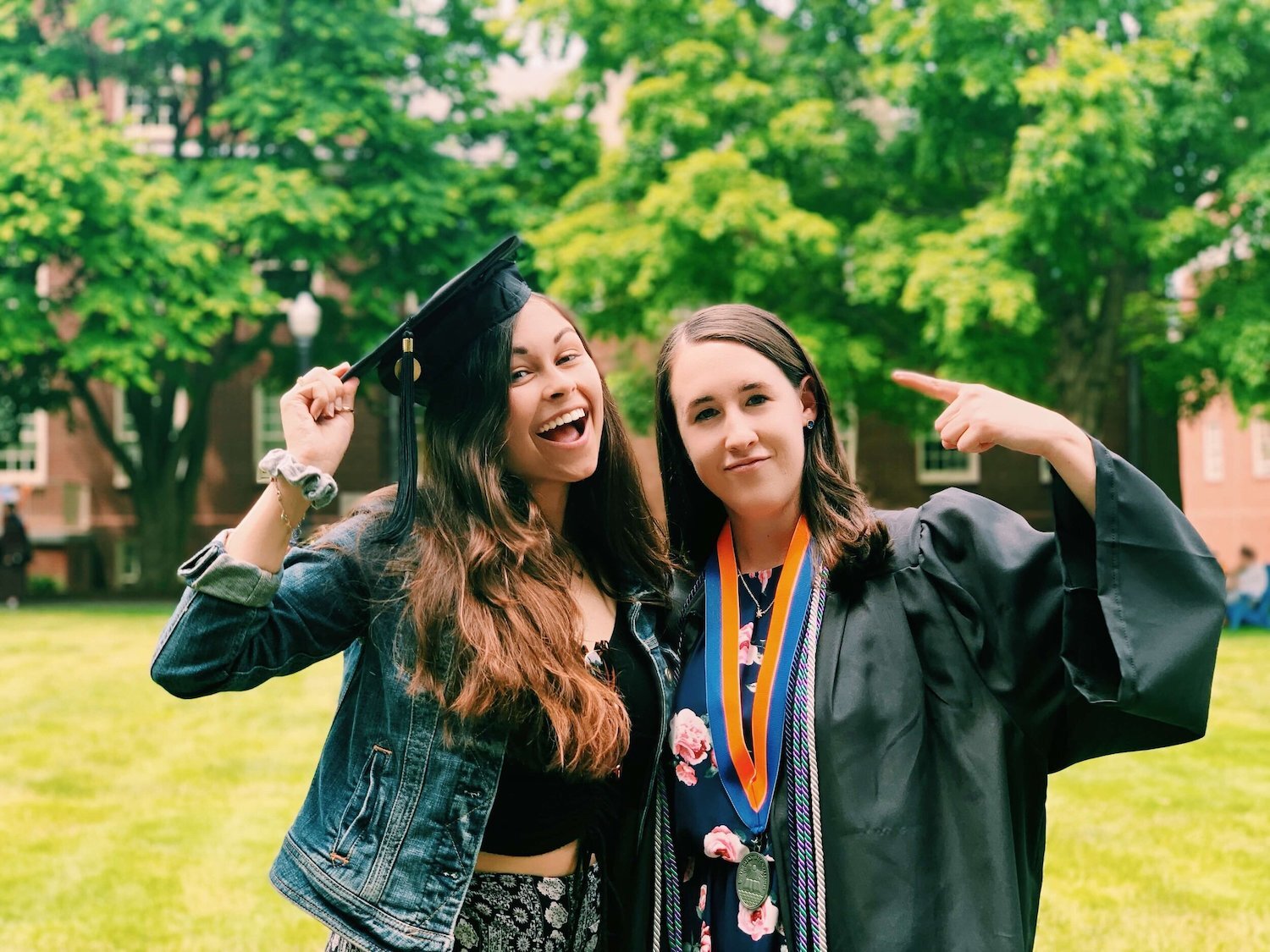 Grace and her roommate, who is in her graduation gown.